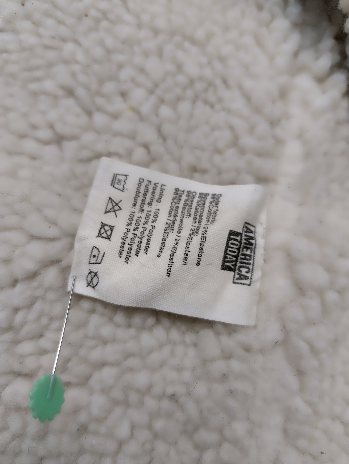 Care instruction tag on the jacket