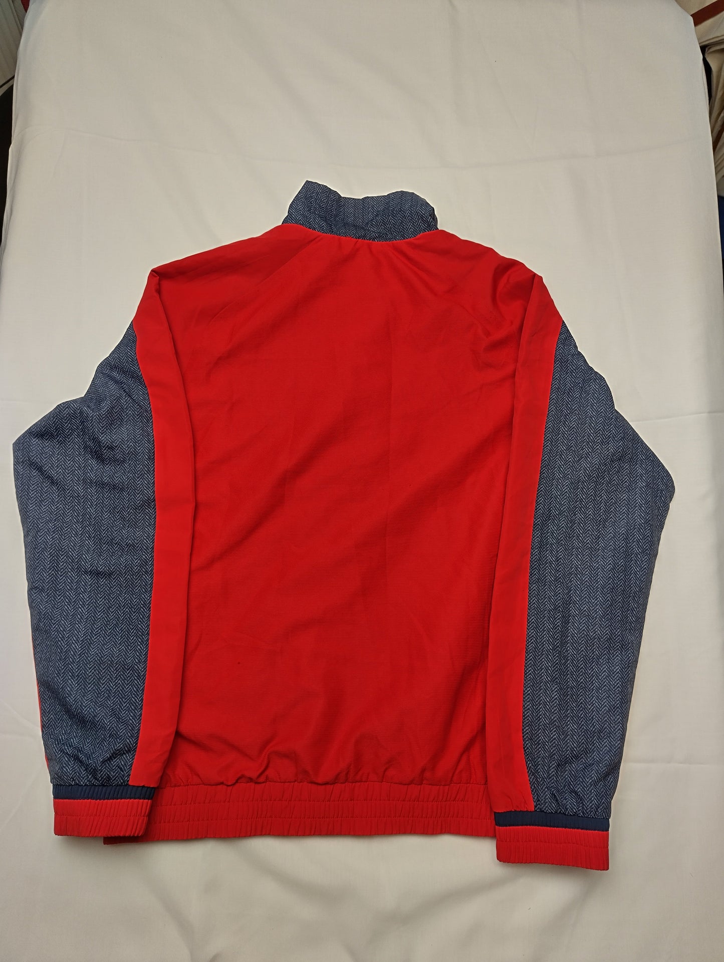 Back view of Lotto red sports jacket