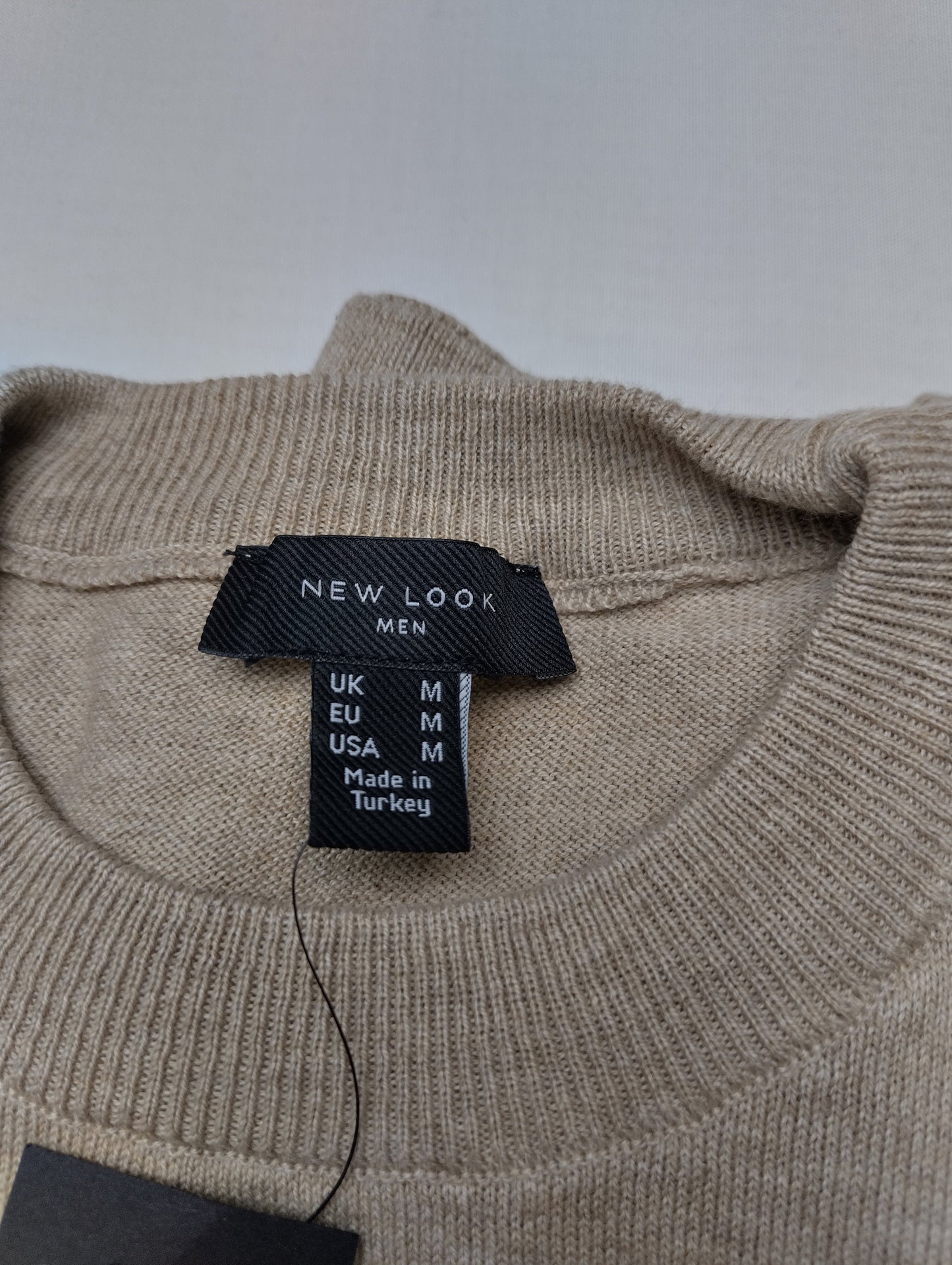 Close-up of sweater label