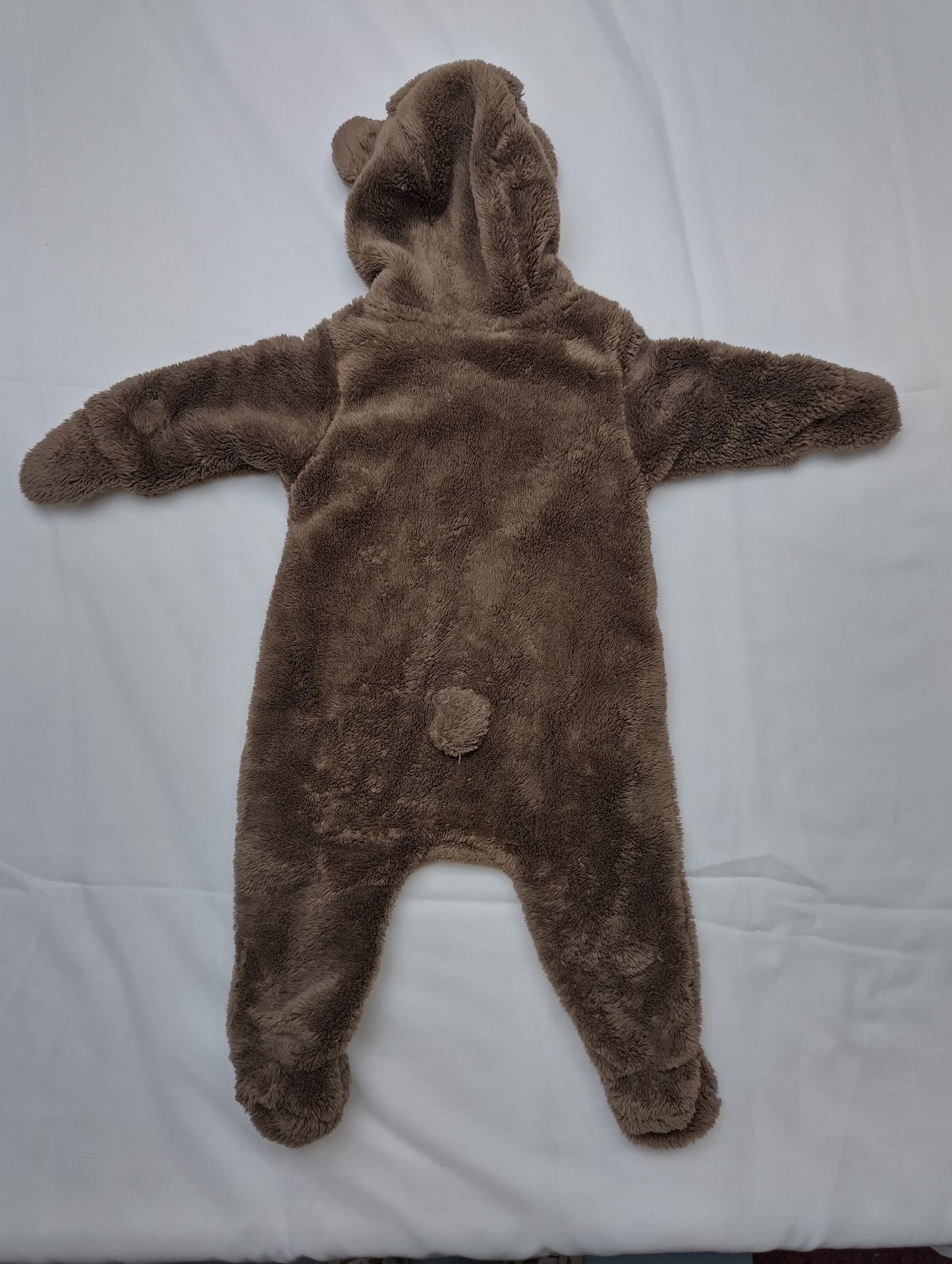 Back view of the brown bear onesie
