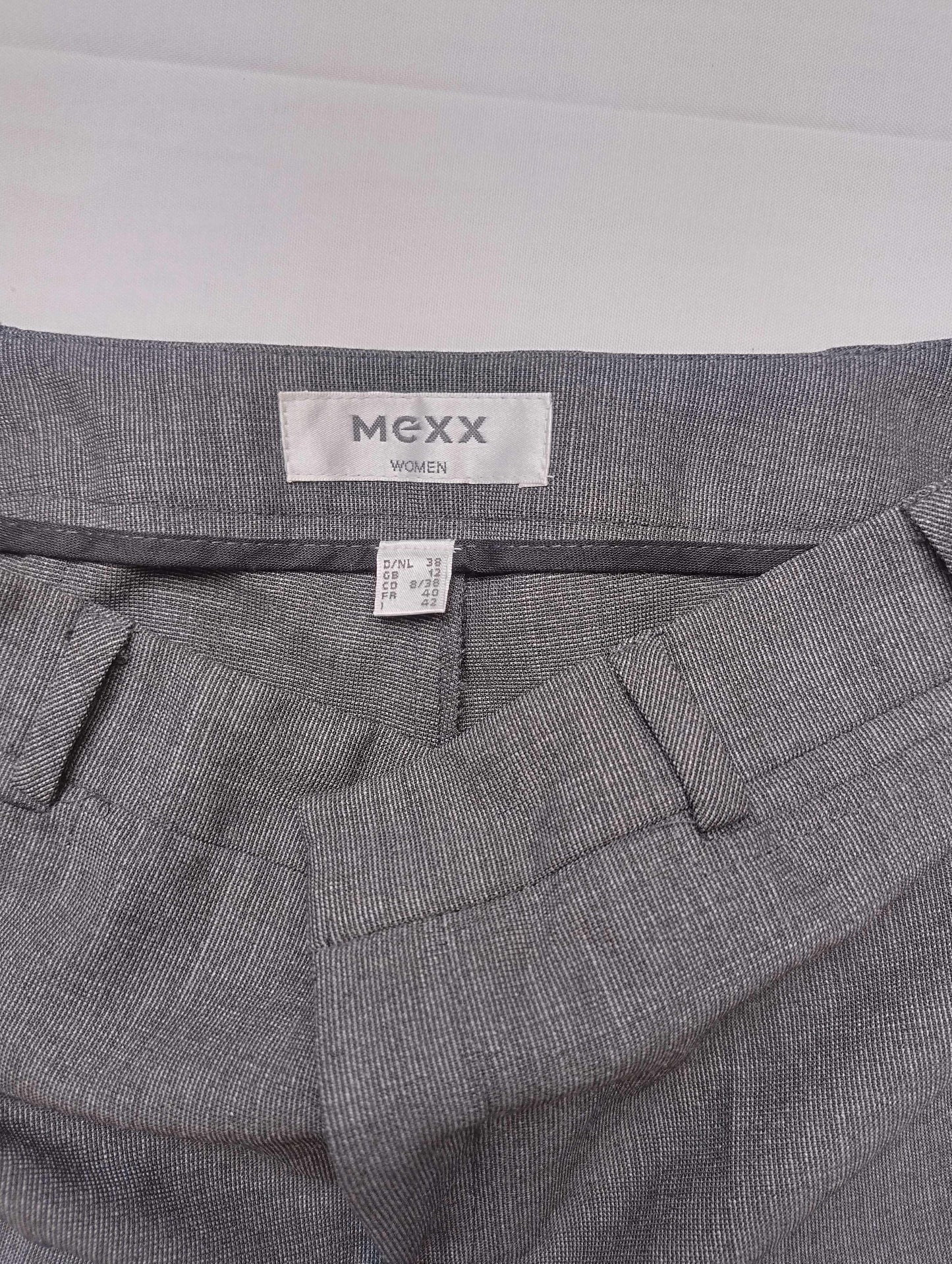 Close-up of Mexx brand label and care tag