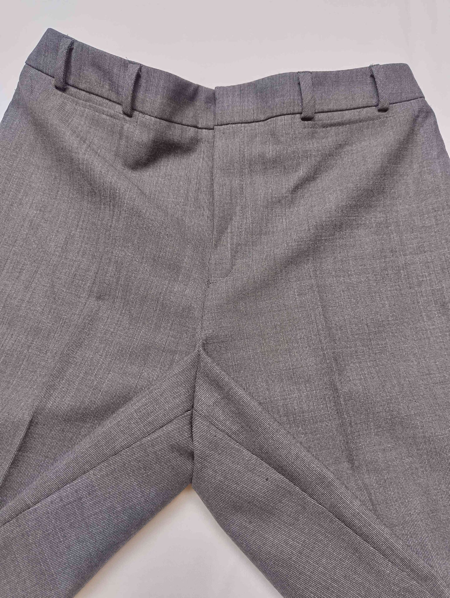 Back view of grey dress pants