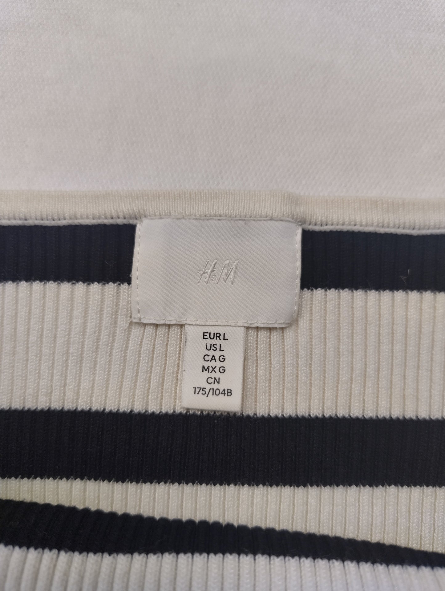 Tag showing sizing and brand information