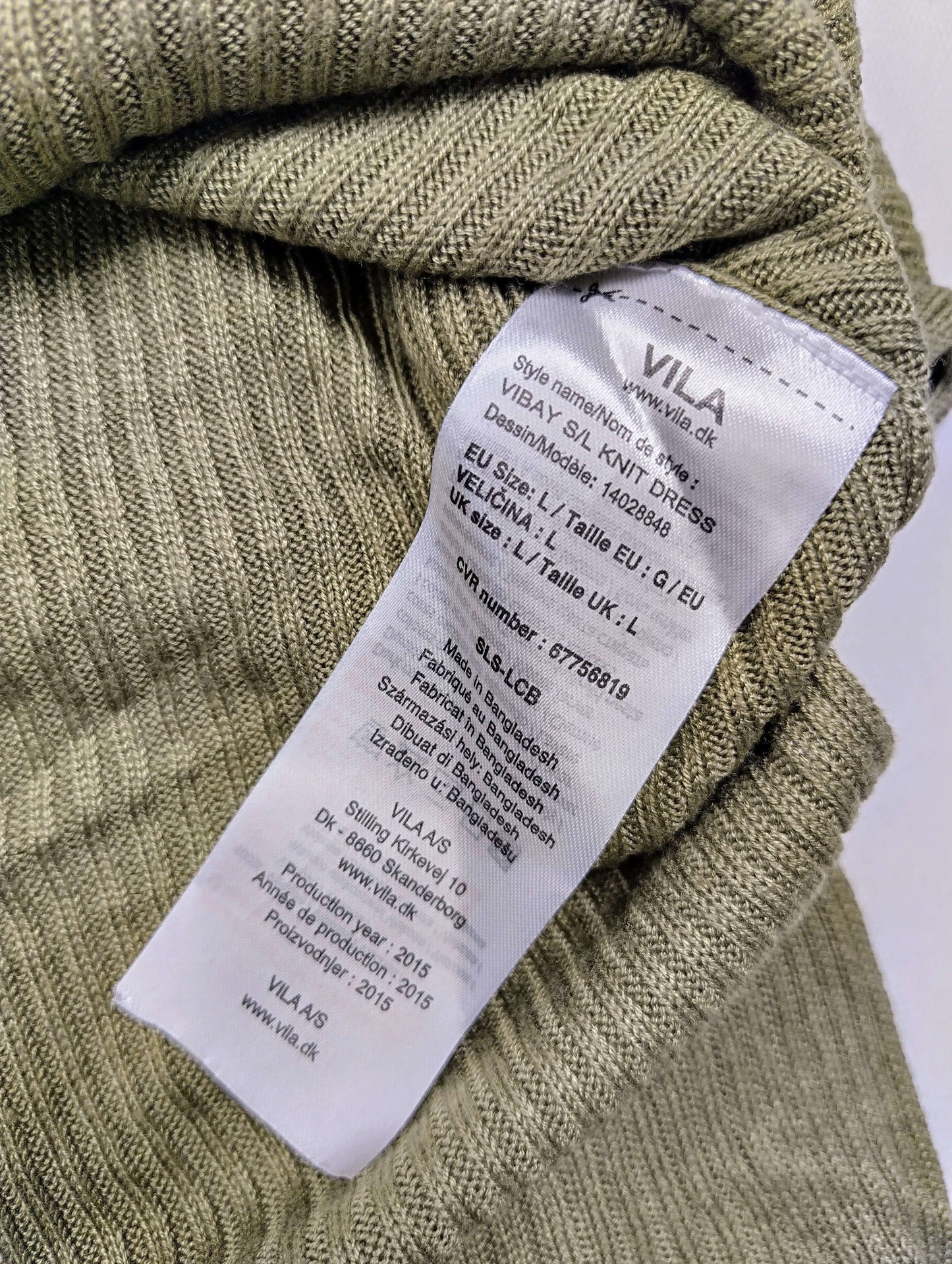 Care instructions tag for VILA dress