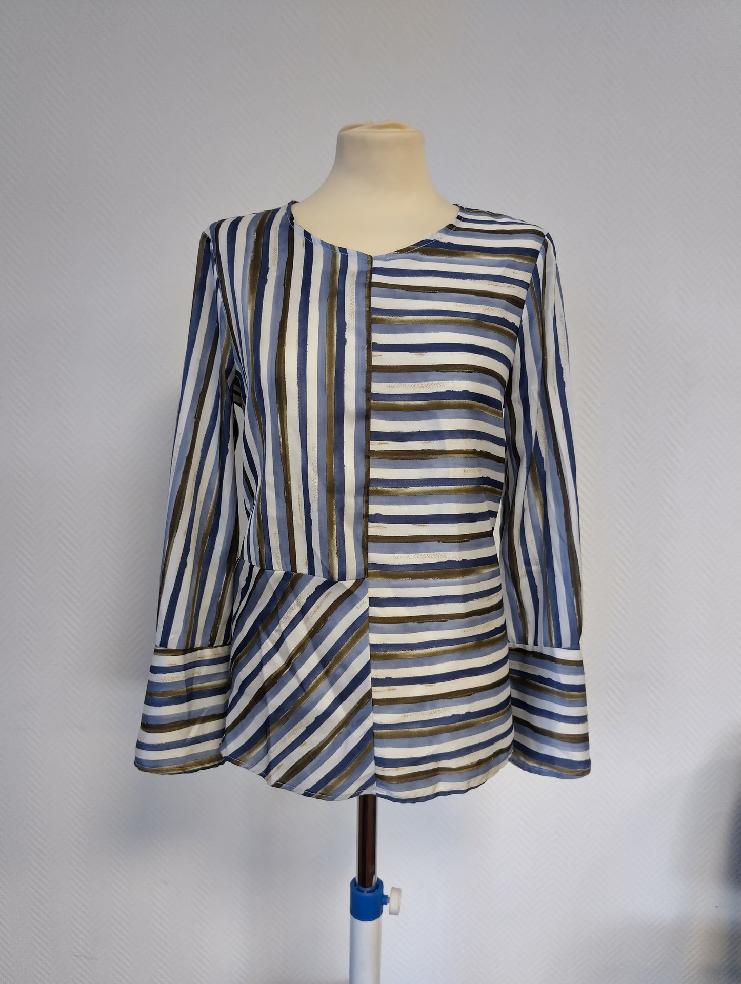 Front view of a stylish striped blouse