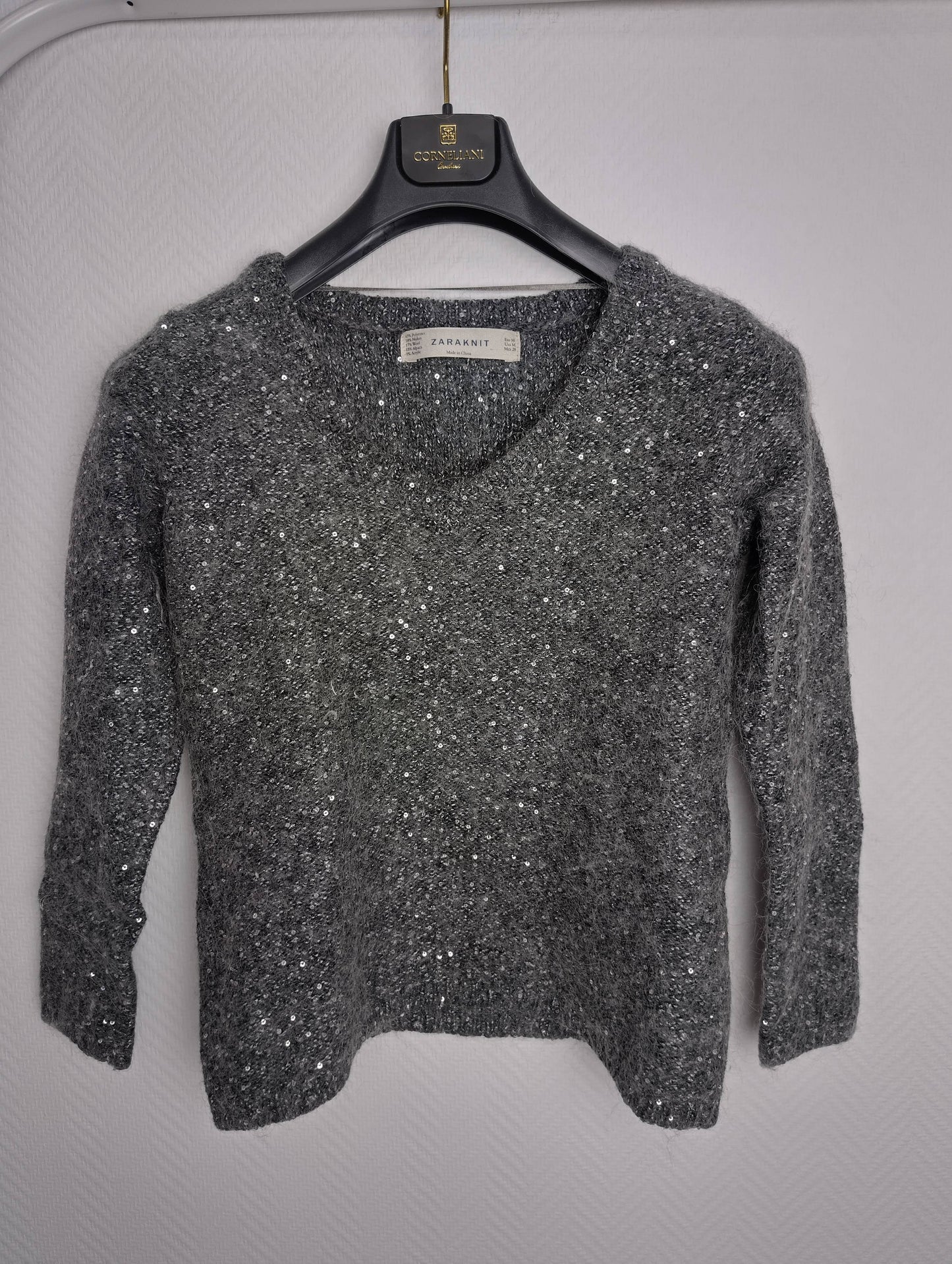 Front view of gray Zaraknit sweater