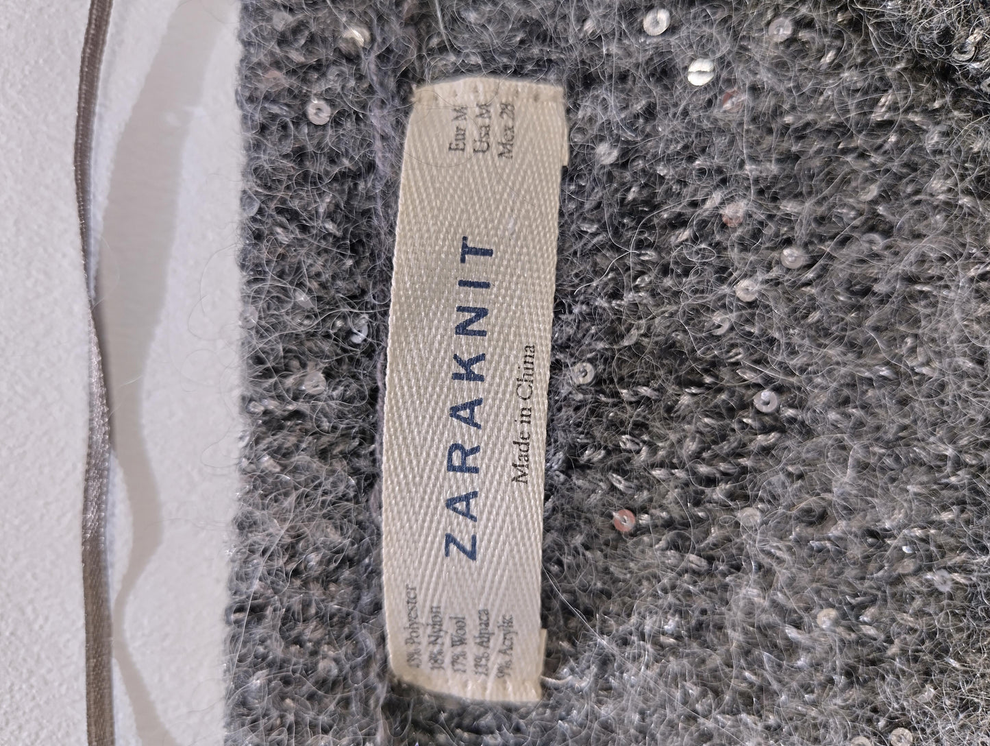 Close-up of Zaraknit label and fabric