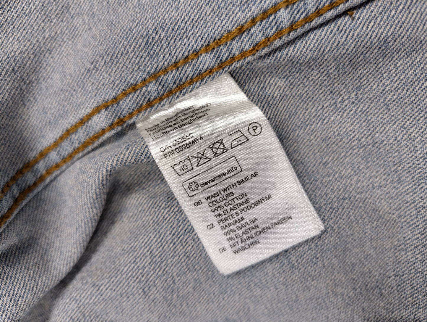 Care label with washing instructions for denim jacket