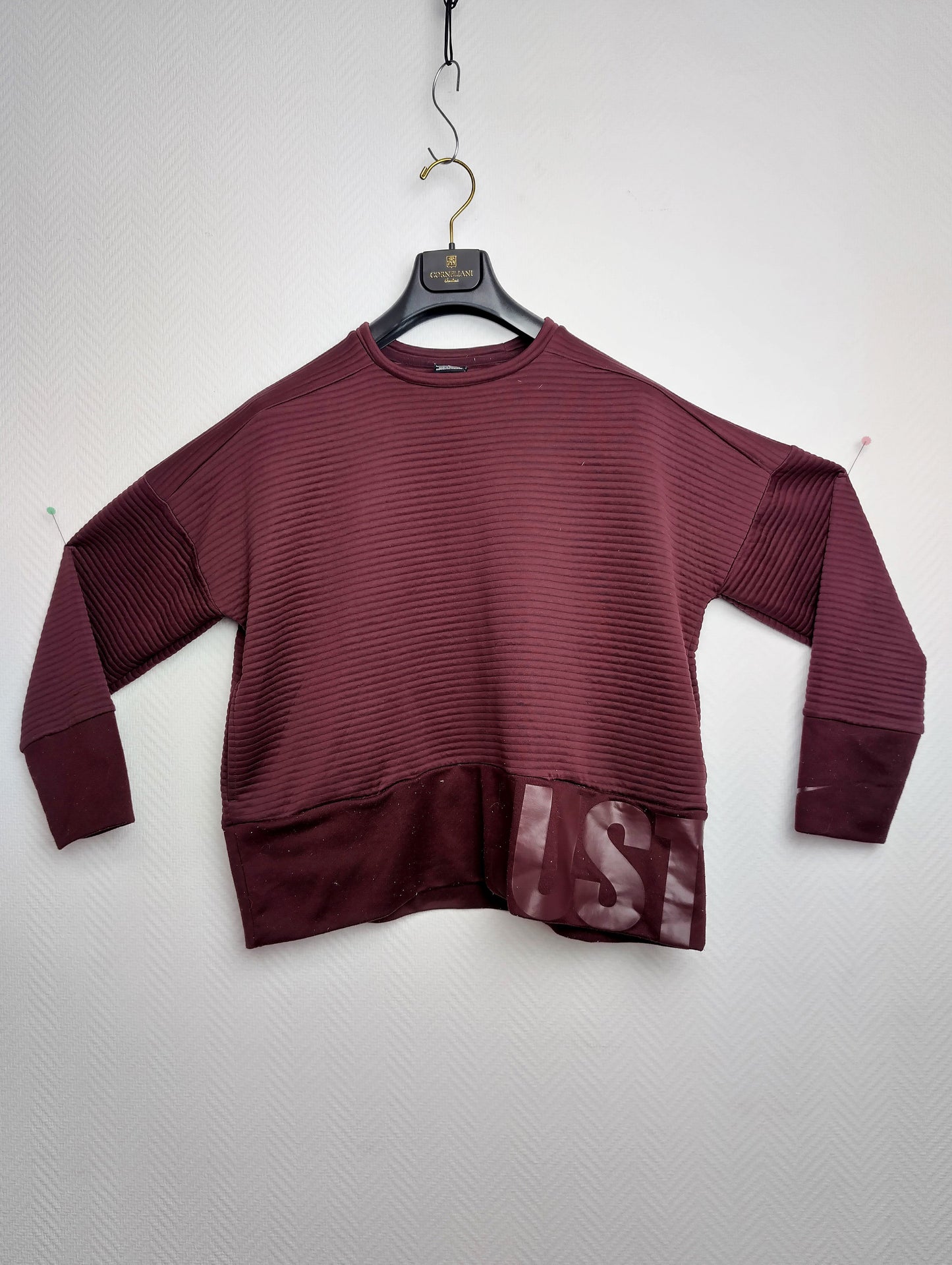 Front view of burgundy Nike Dri-FIT sweatshirt