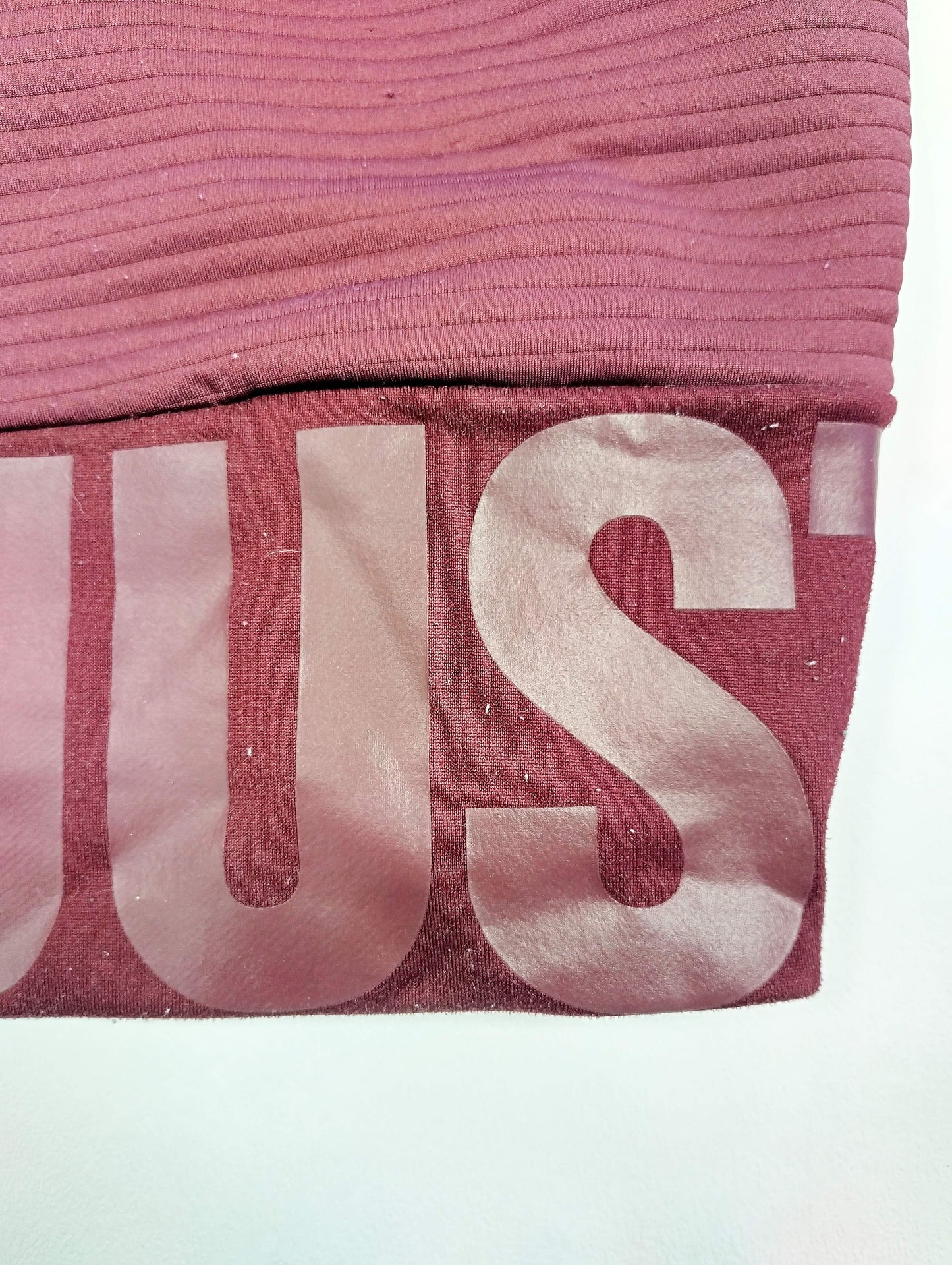 Close-up of 'JUST DO IT' logo on sweatshirt