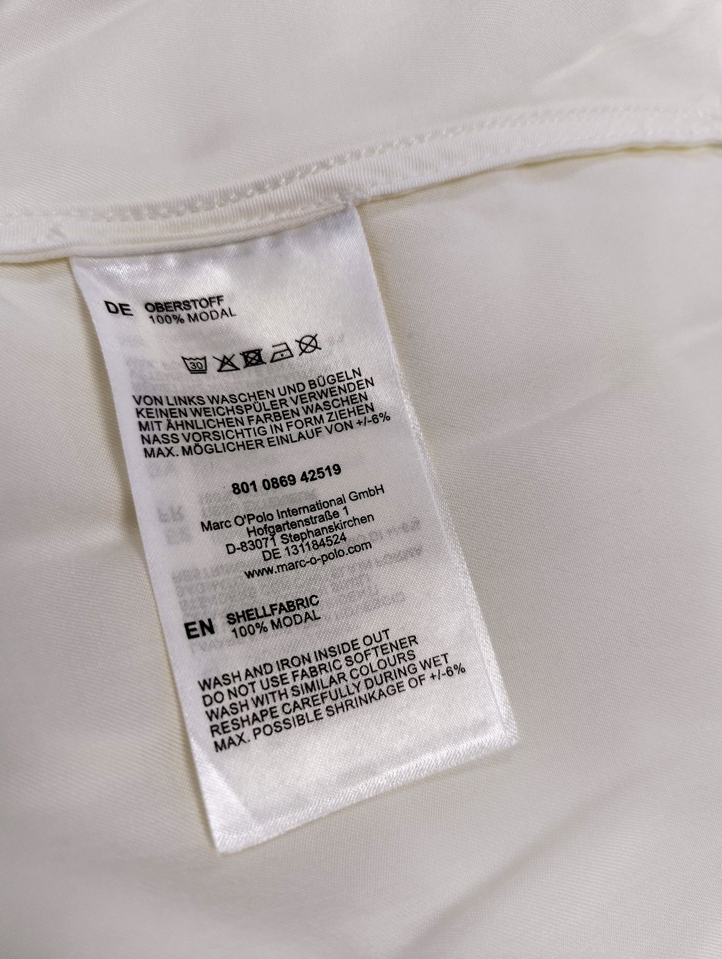 Care instructions and fabric details of the blouse