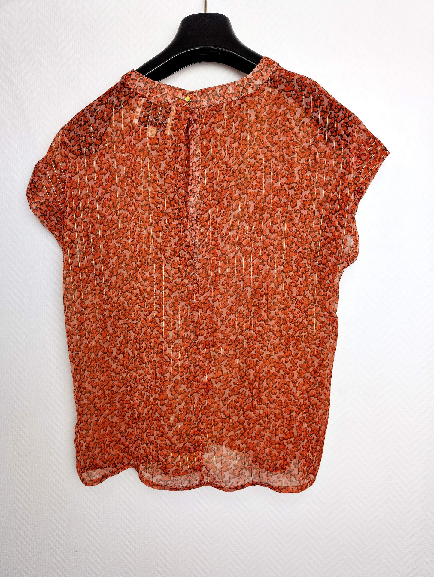 Alternate back view of the floral top