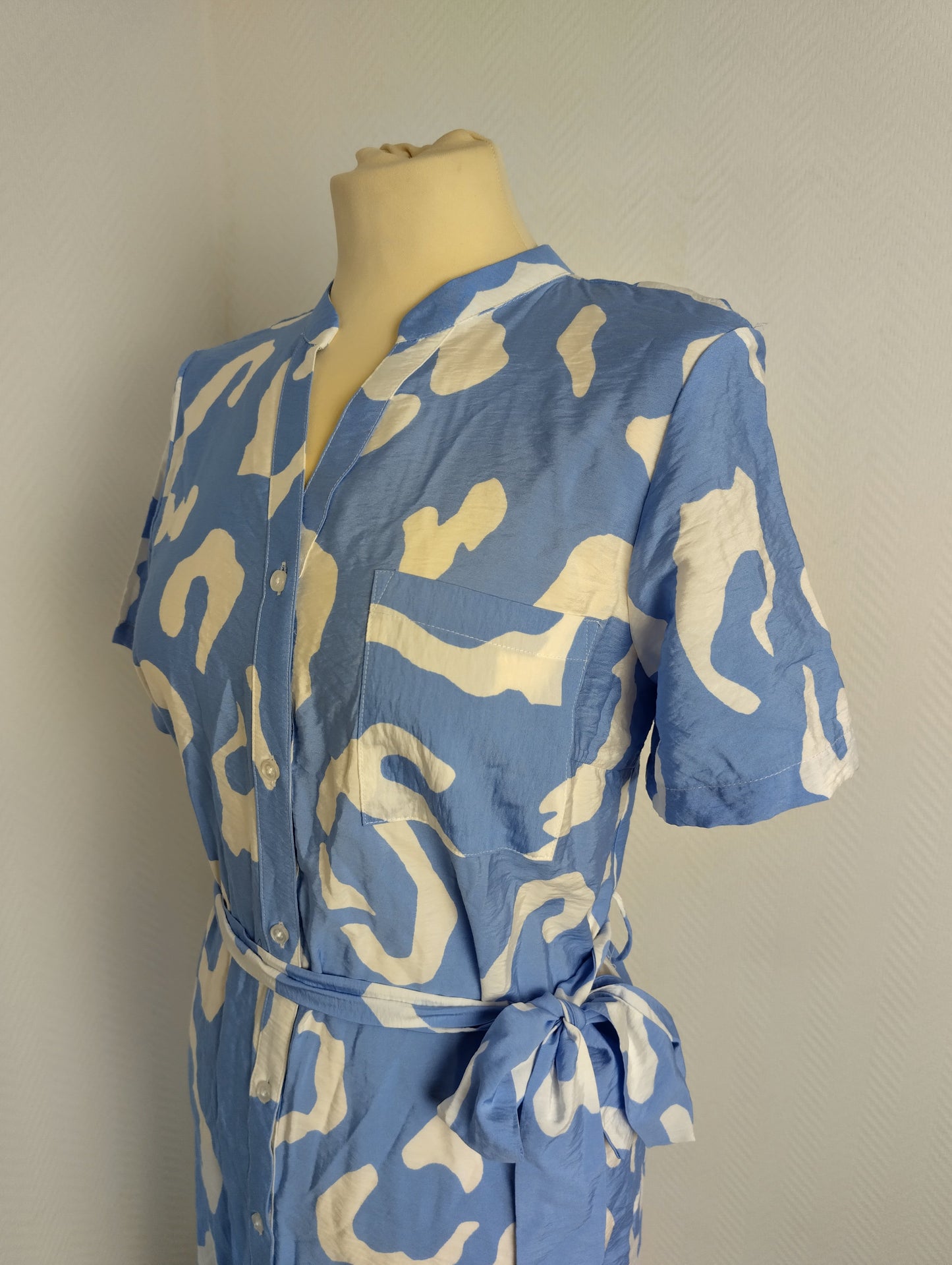 Side view of blue and white shirt dress