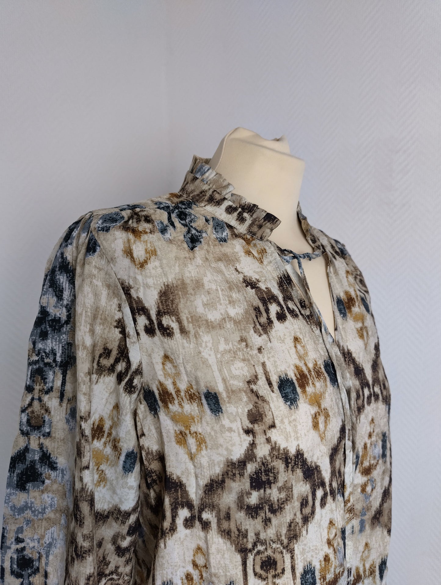 Side view of VILA boho print long sleeve top