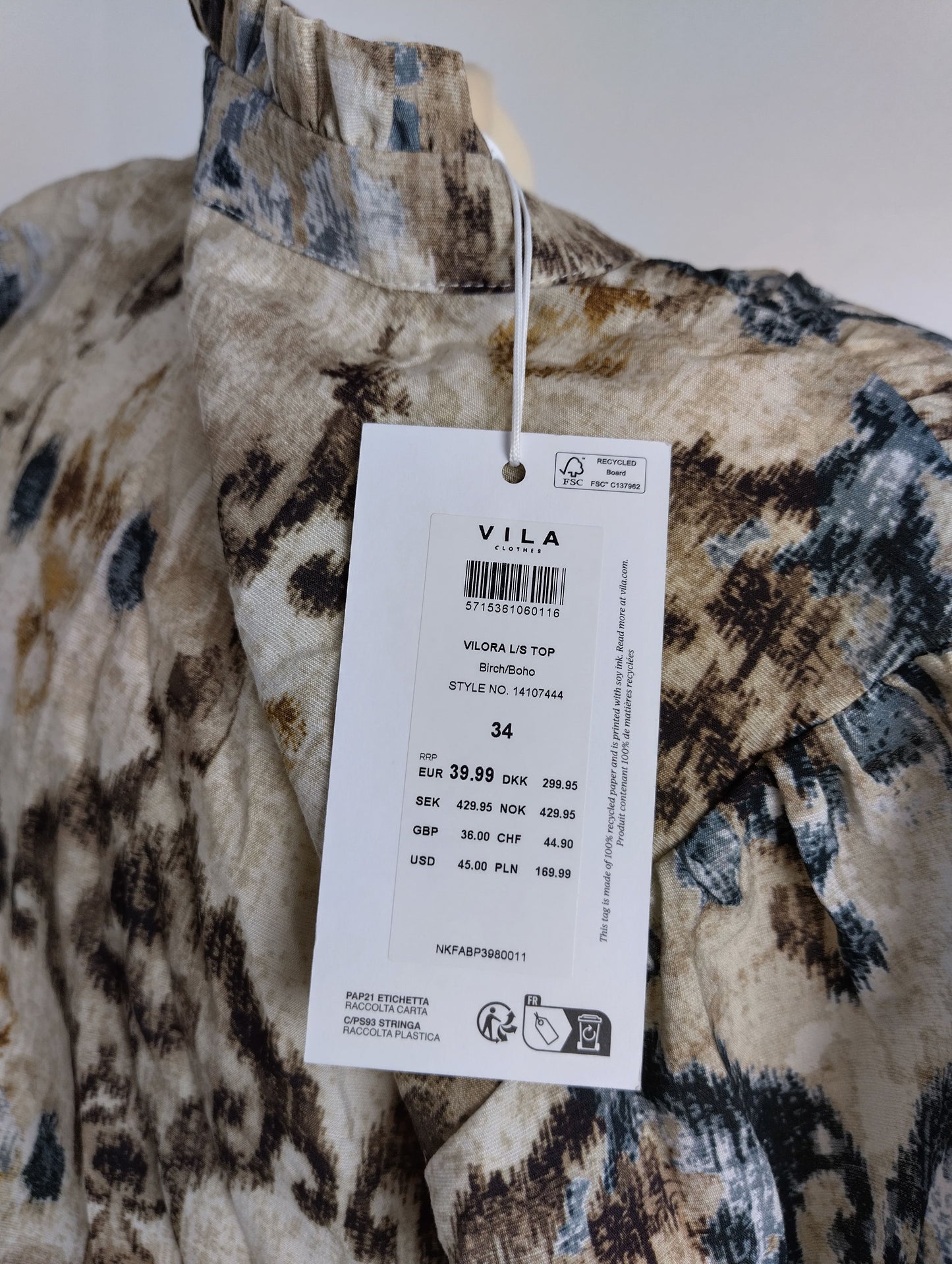 Close-up of VILA top with tag