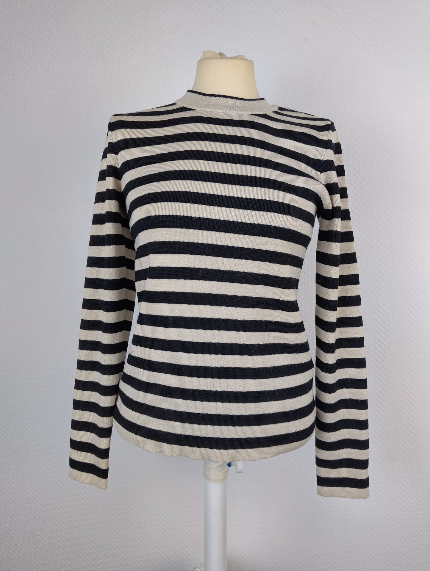 Front view of striped knit pullover