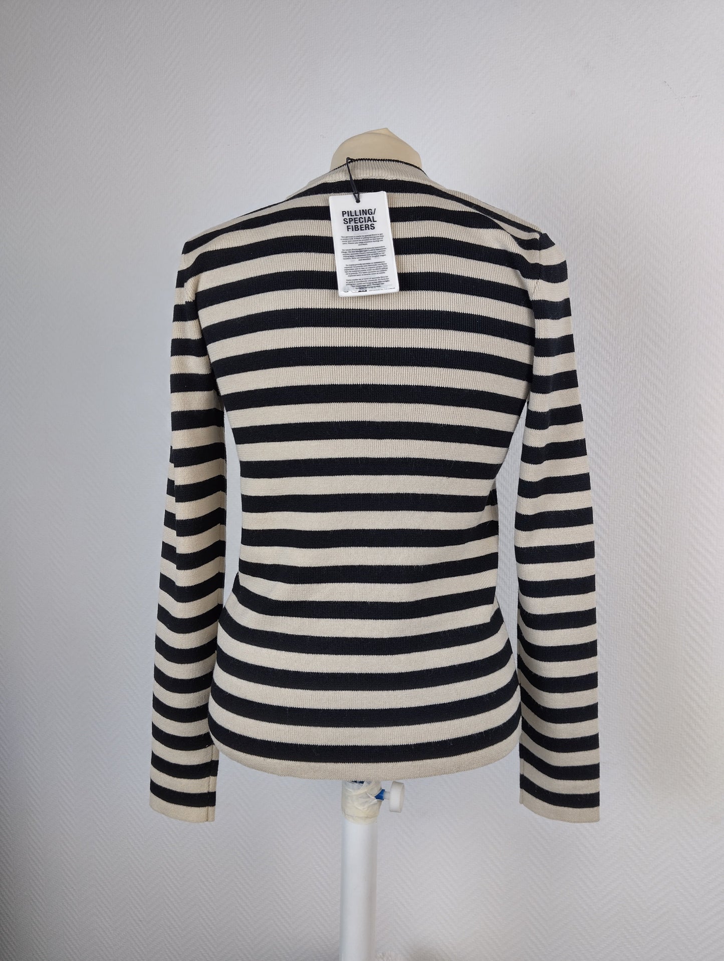 Back view of striped knit pullover