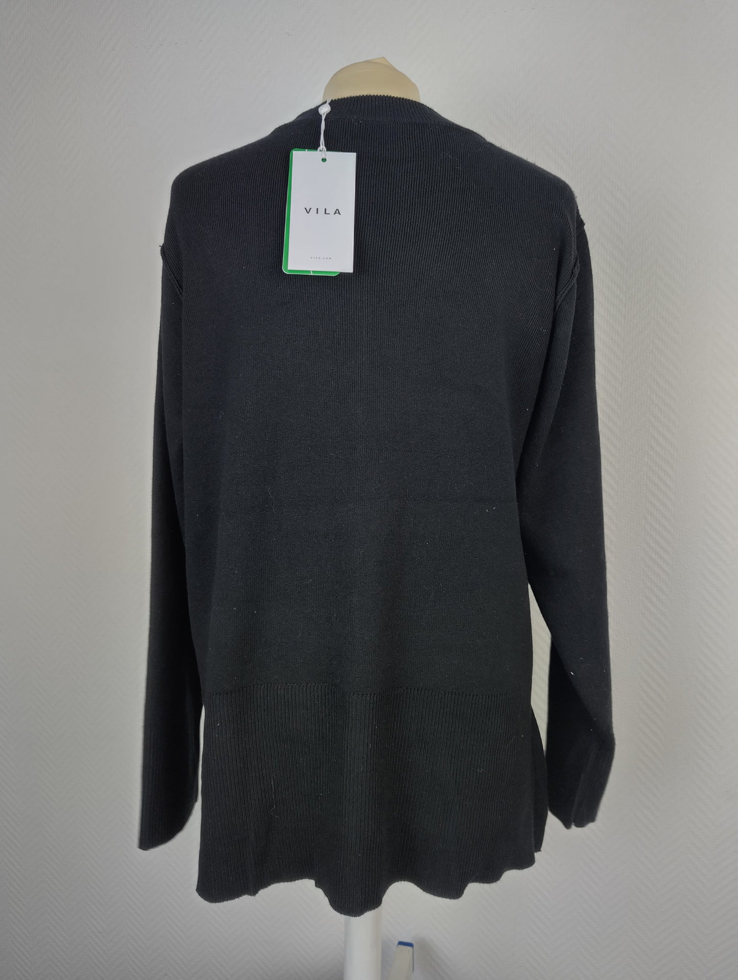 Back view of black Vila knit sweater