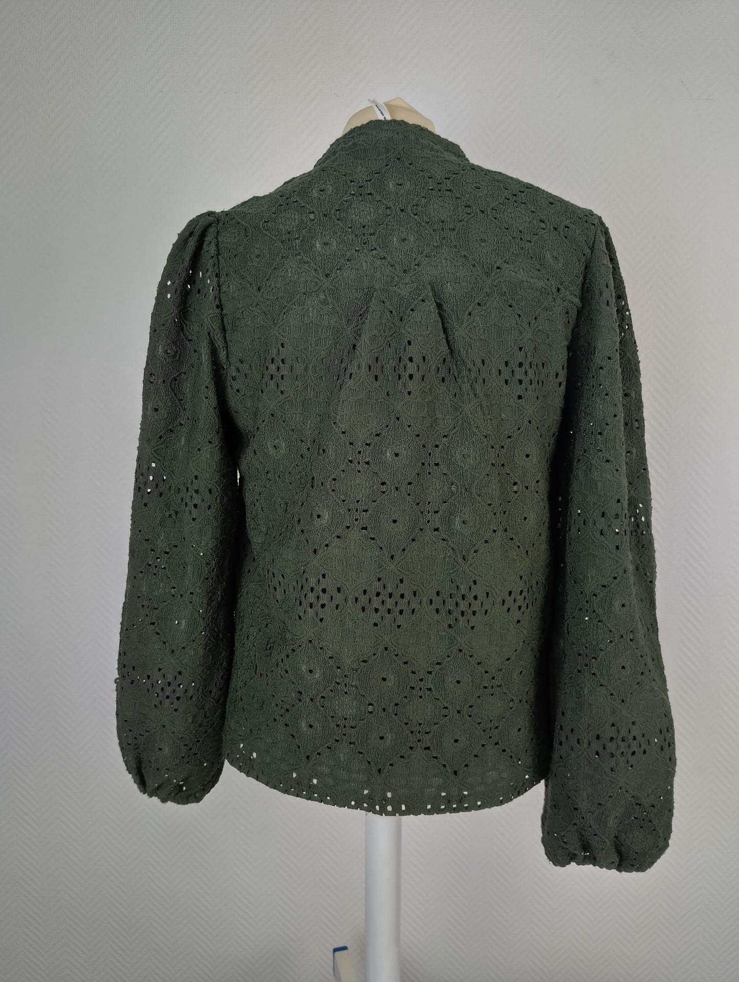 Back view of dark green lace blouse