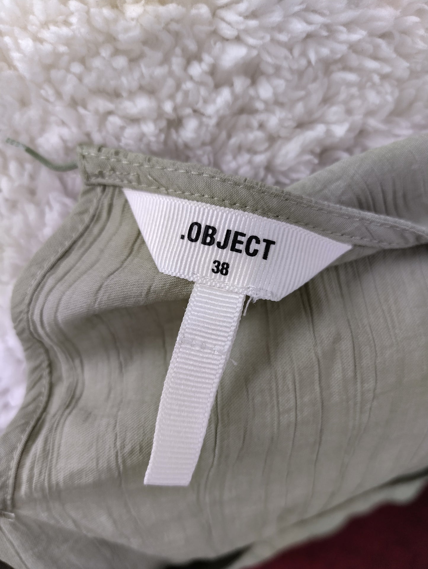 Close-up of Object brand tag showing size 38