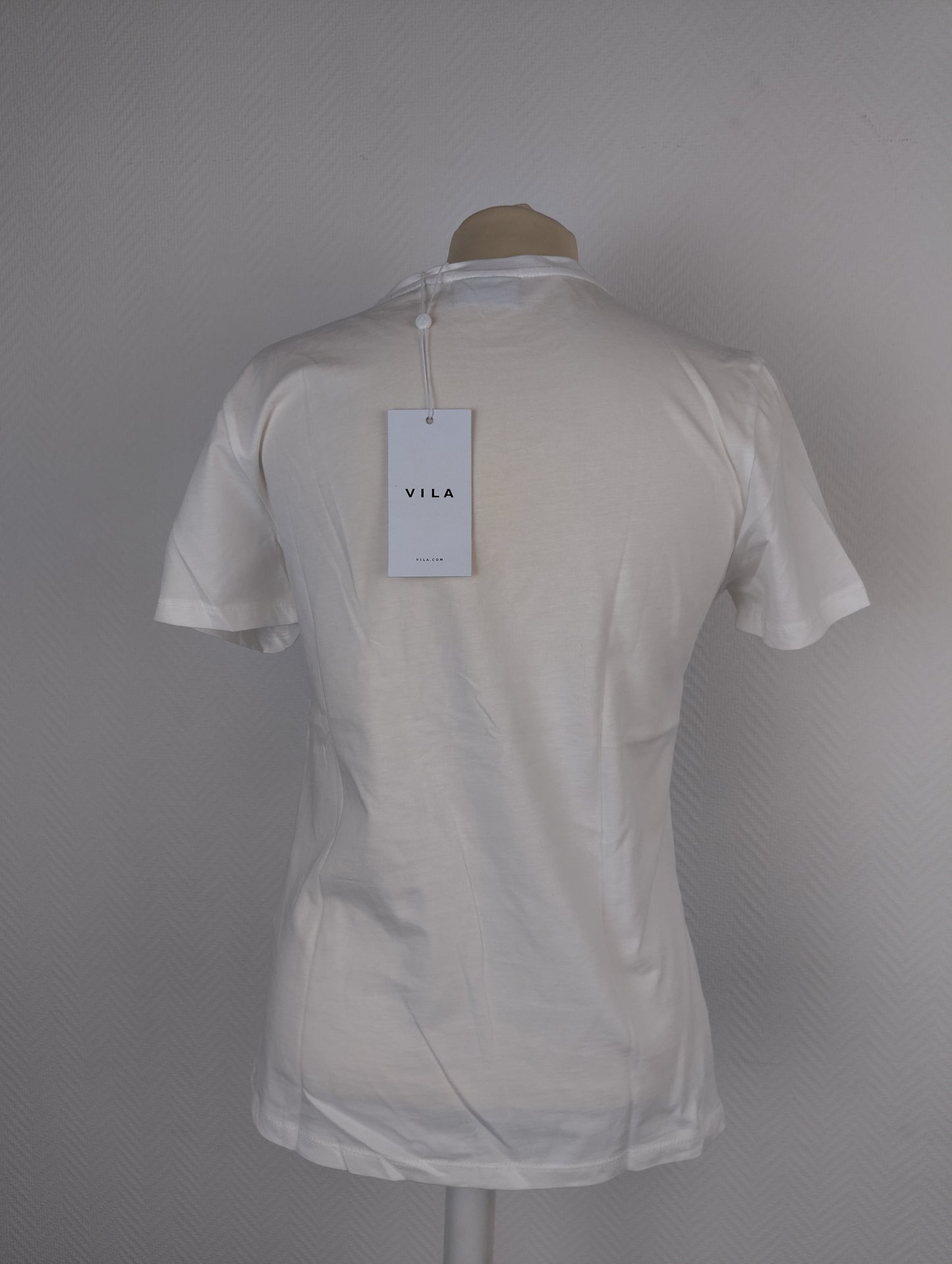 Back view of Vila T-shirt with tag attached