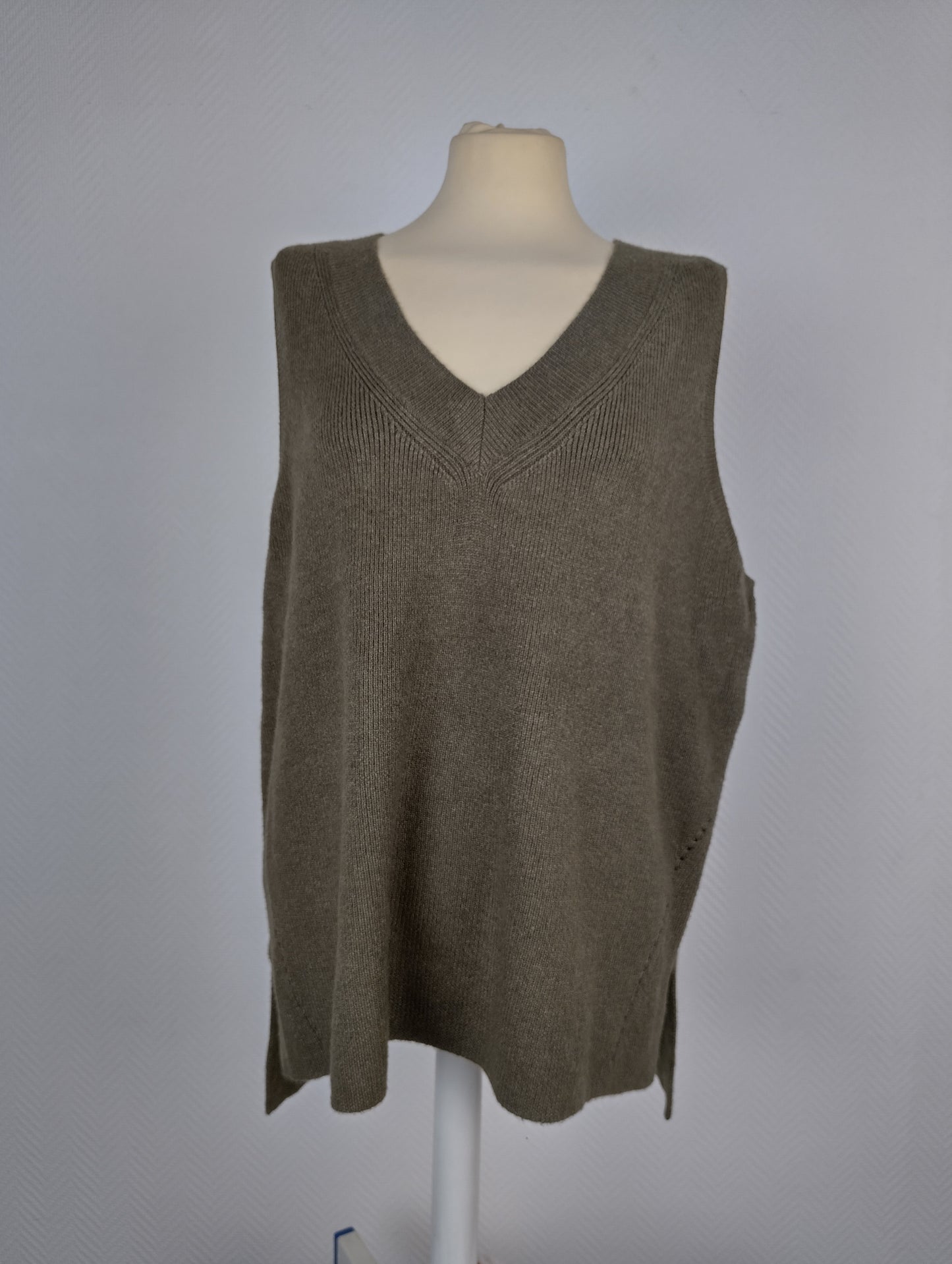 Side view of olive green knit vest