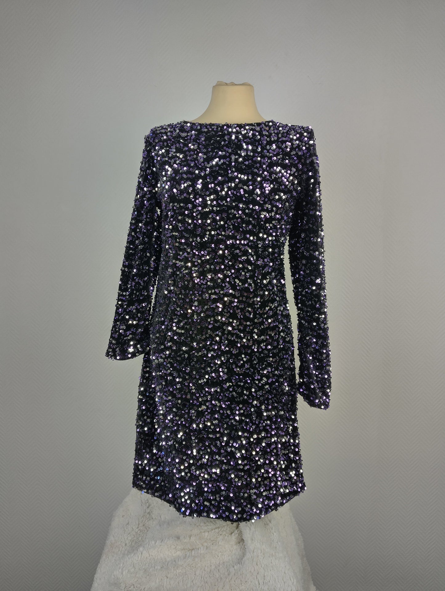 Front view of a black and purple sequined dress