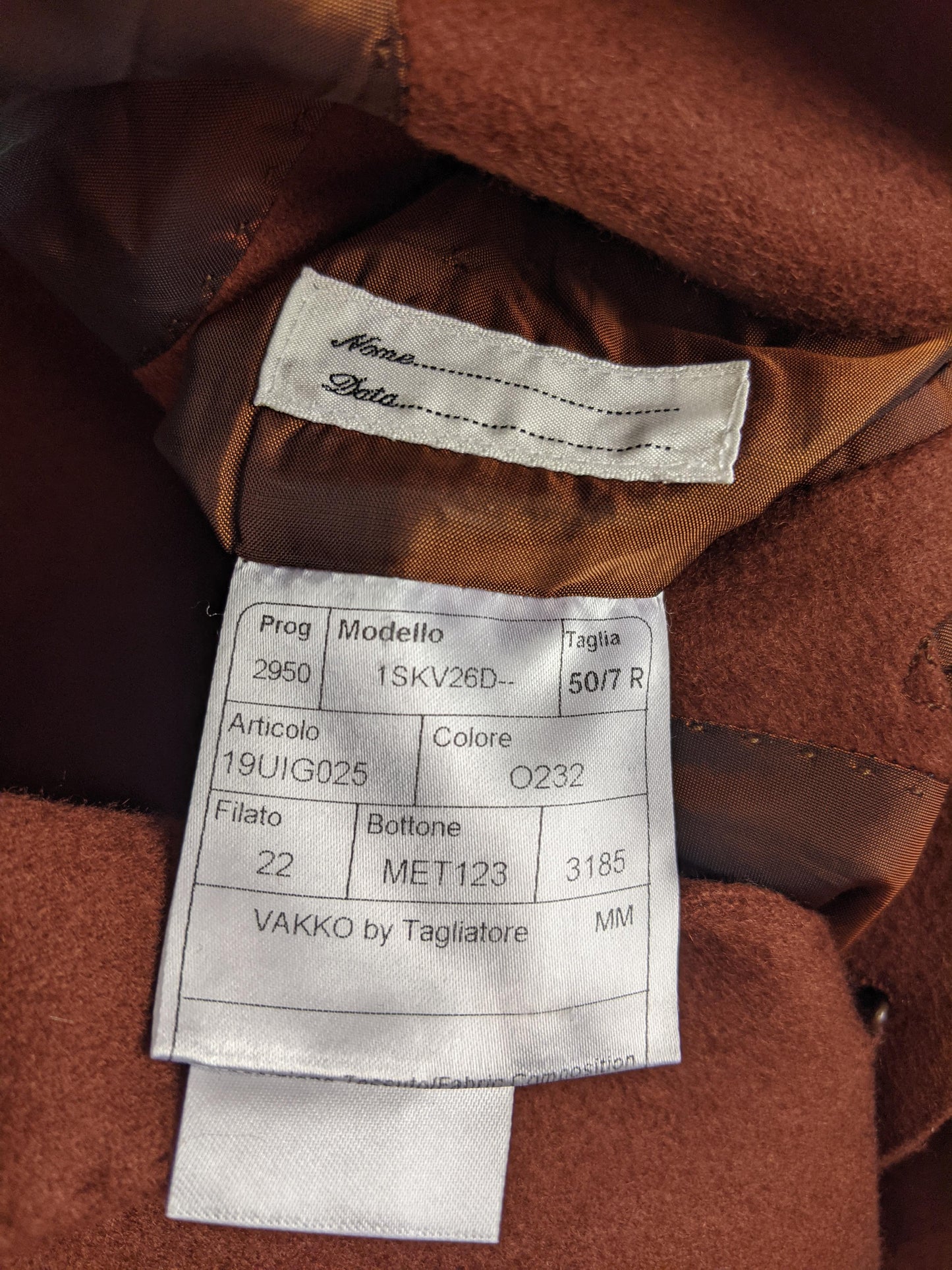 Inside tag of Vakko by Tagliatore blazer