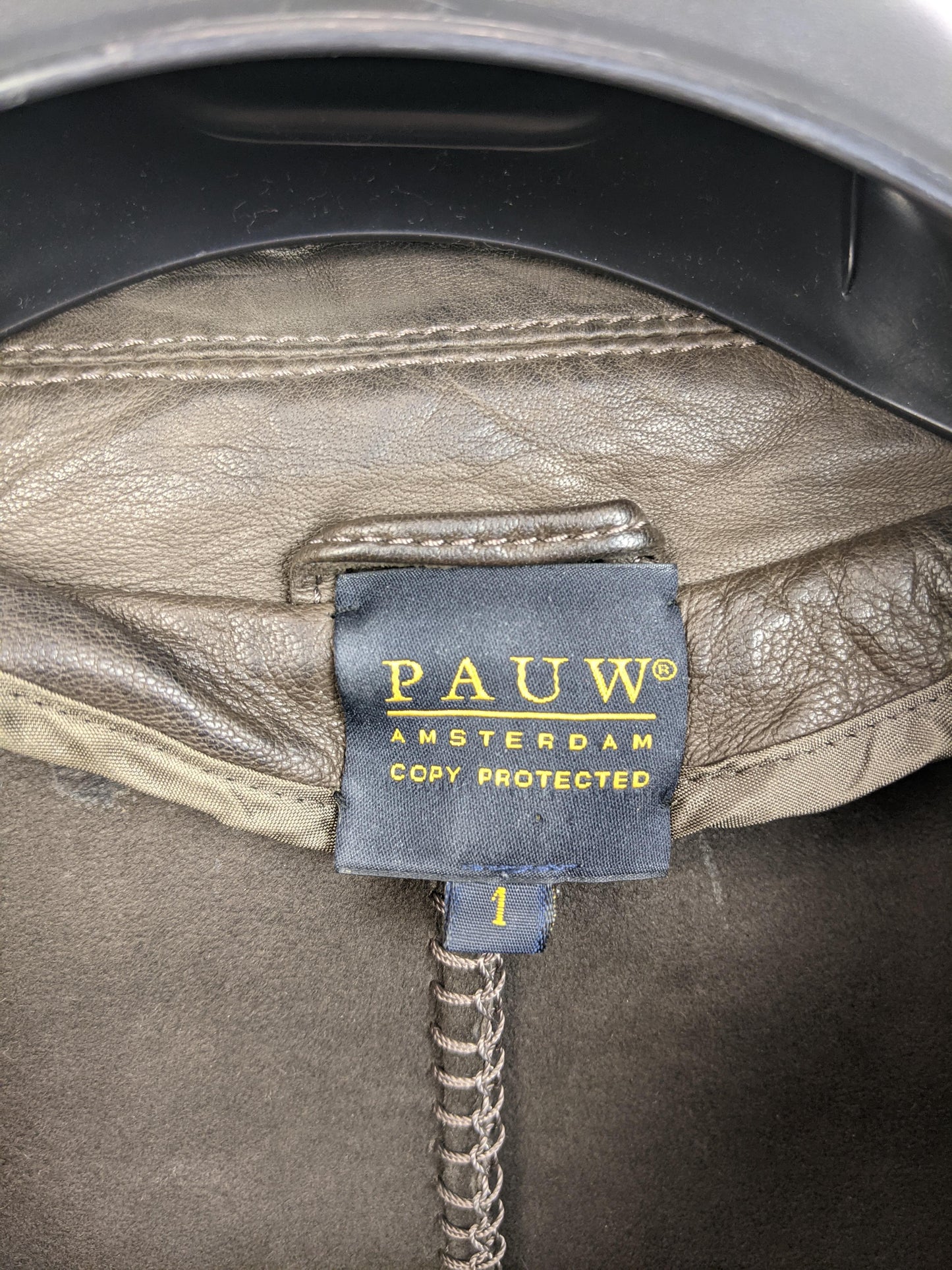Close-up of Pauw Amsterdam label