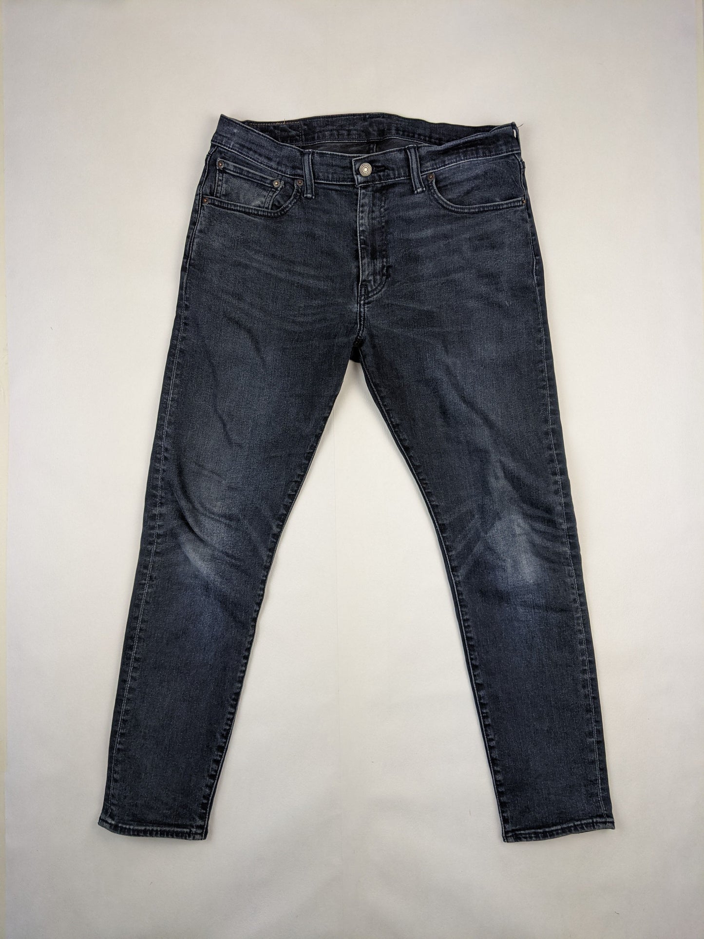 Front view of Levi's dark wash jeans