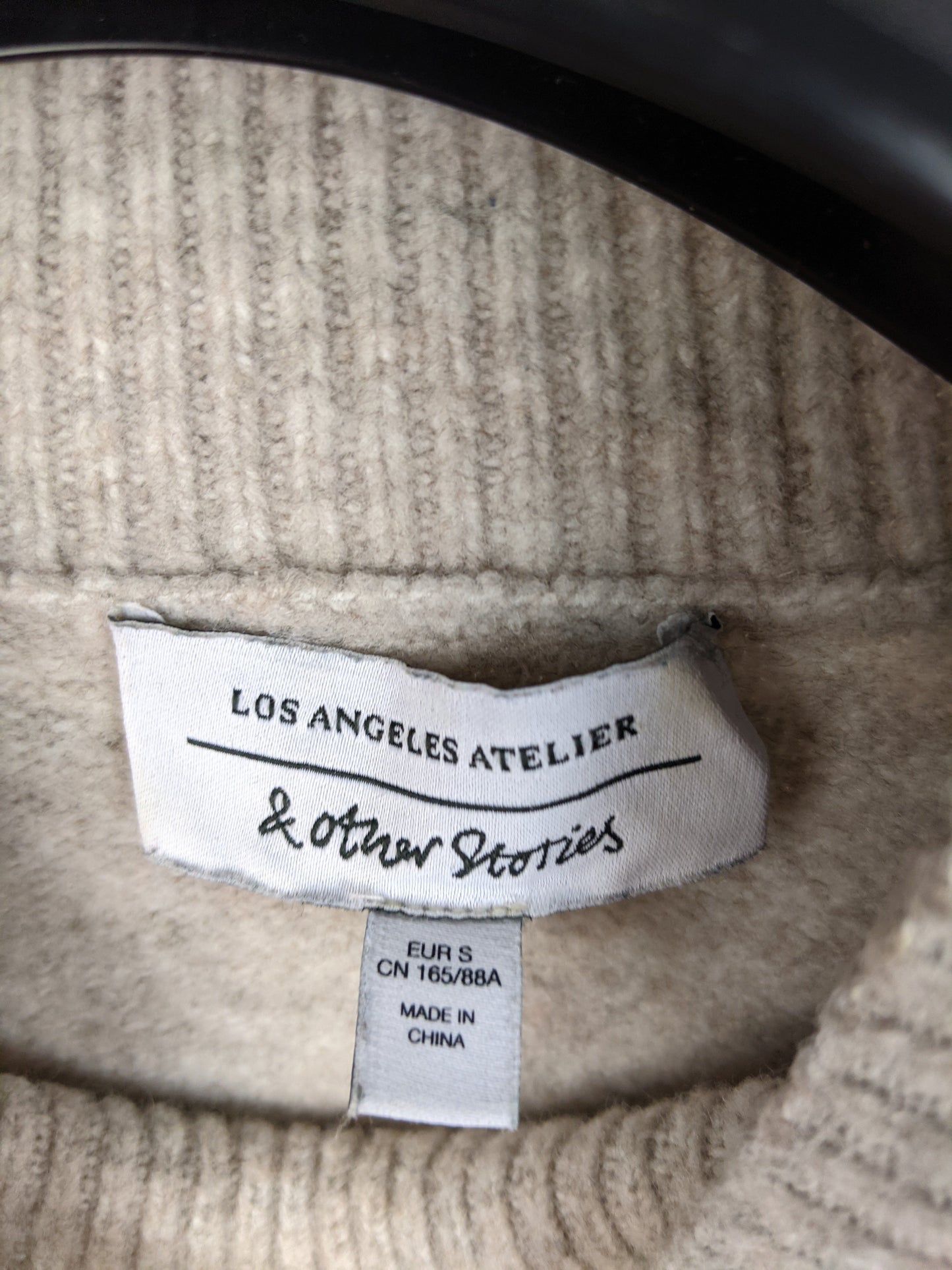 Label of & Other Stories sweater