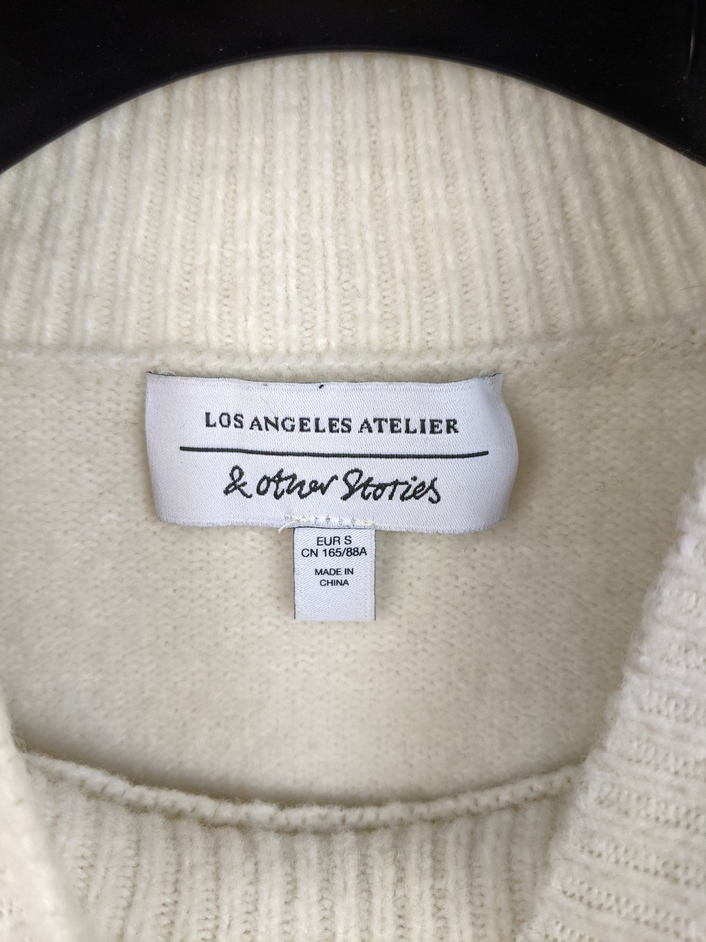 Close-up of & Other Stories label