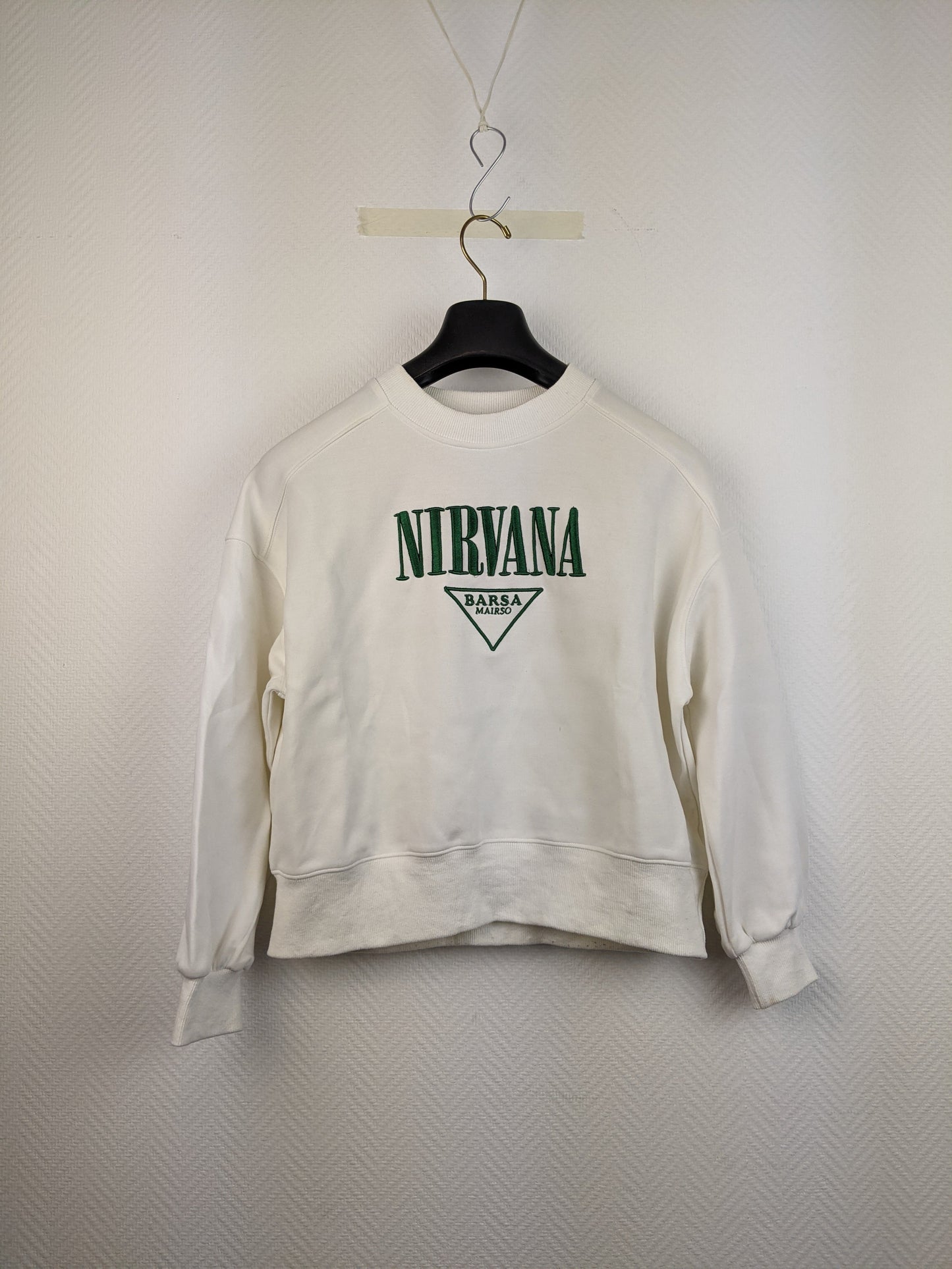 Front view of white Nirvana sweatshirt