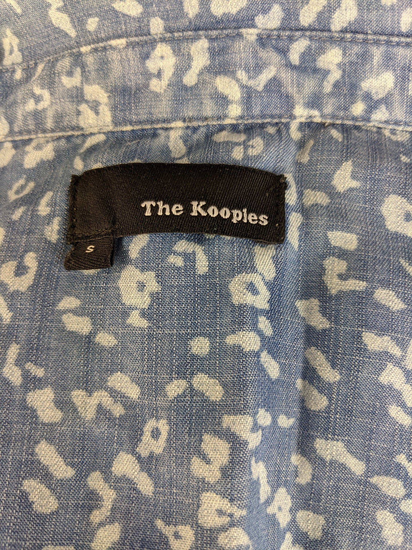 Label of The Kooples blue patterned denim shirt