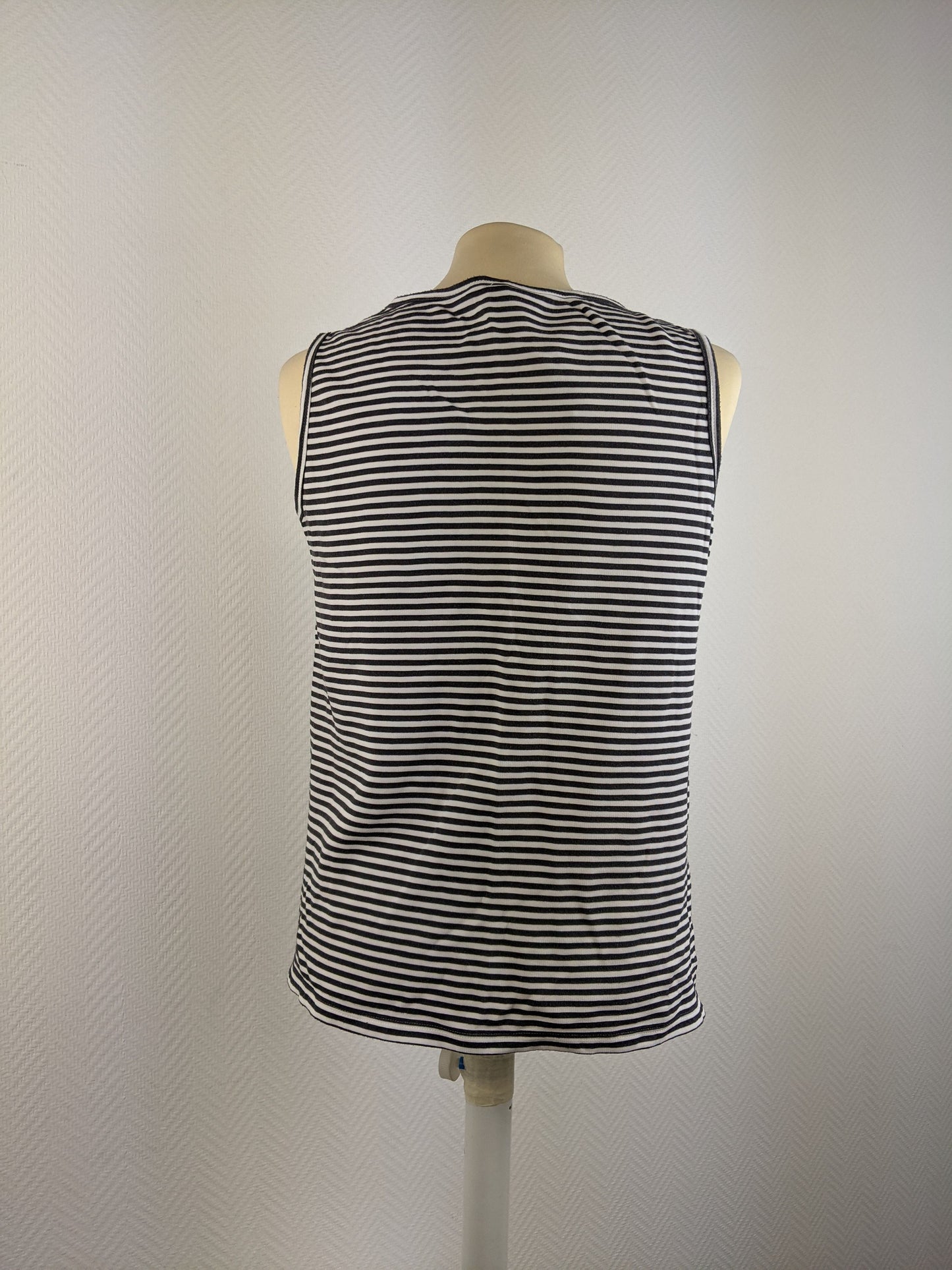 Back view of Vanilia black striped sleeveless top