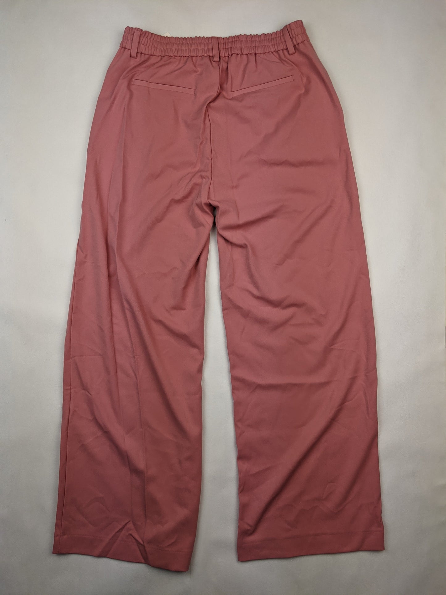 Back view of pink trousers