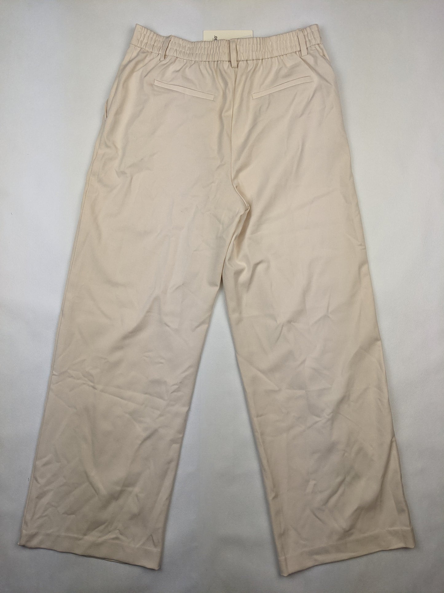 Back view of ivory wide-leg pants