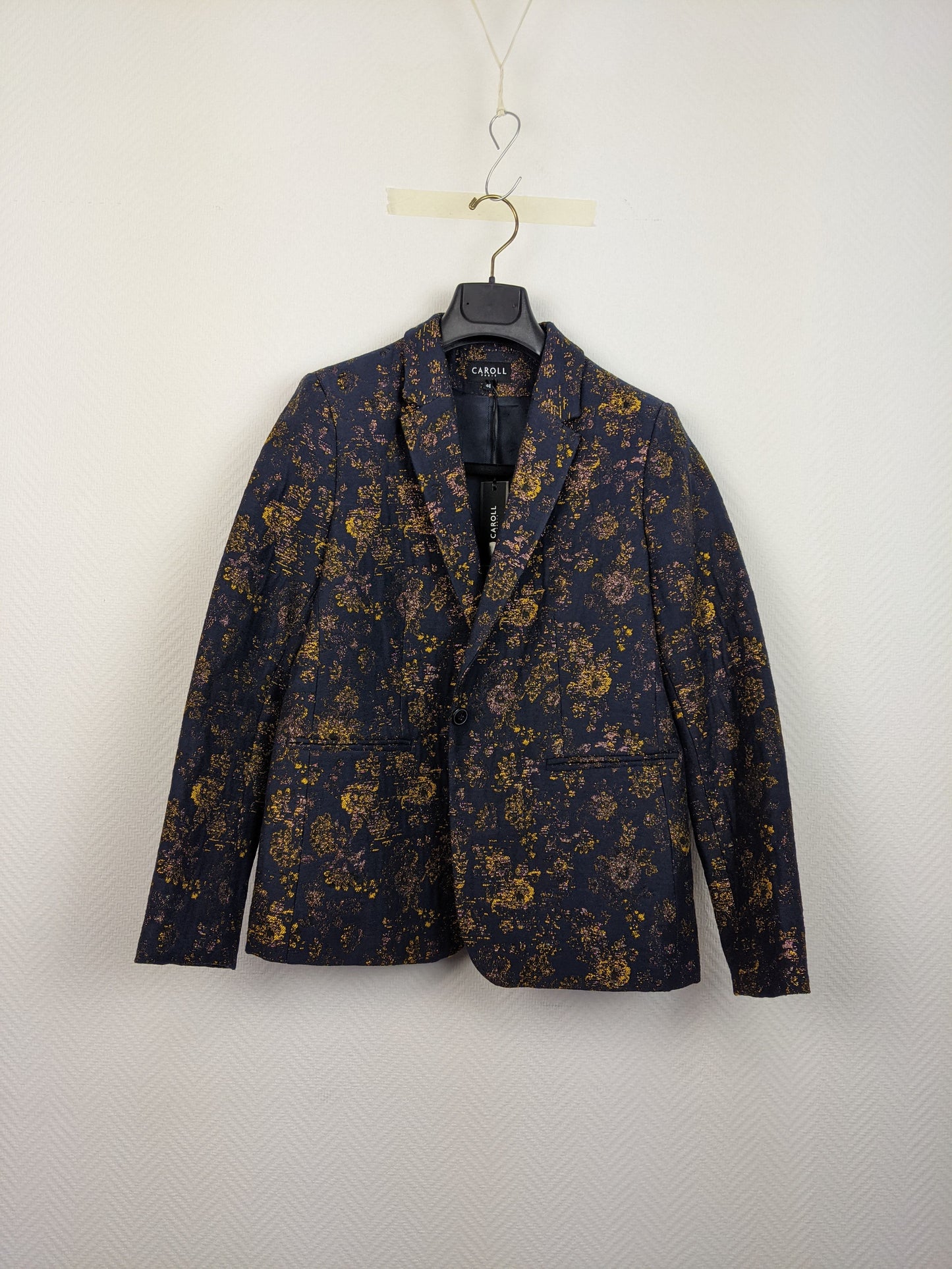 Front view of Caroll floral patterned blazer