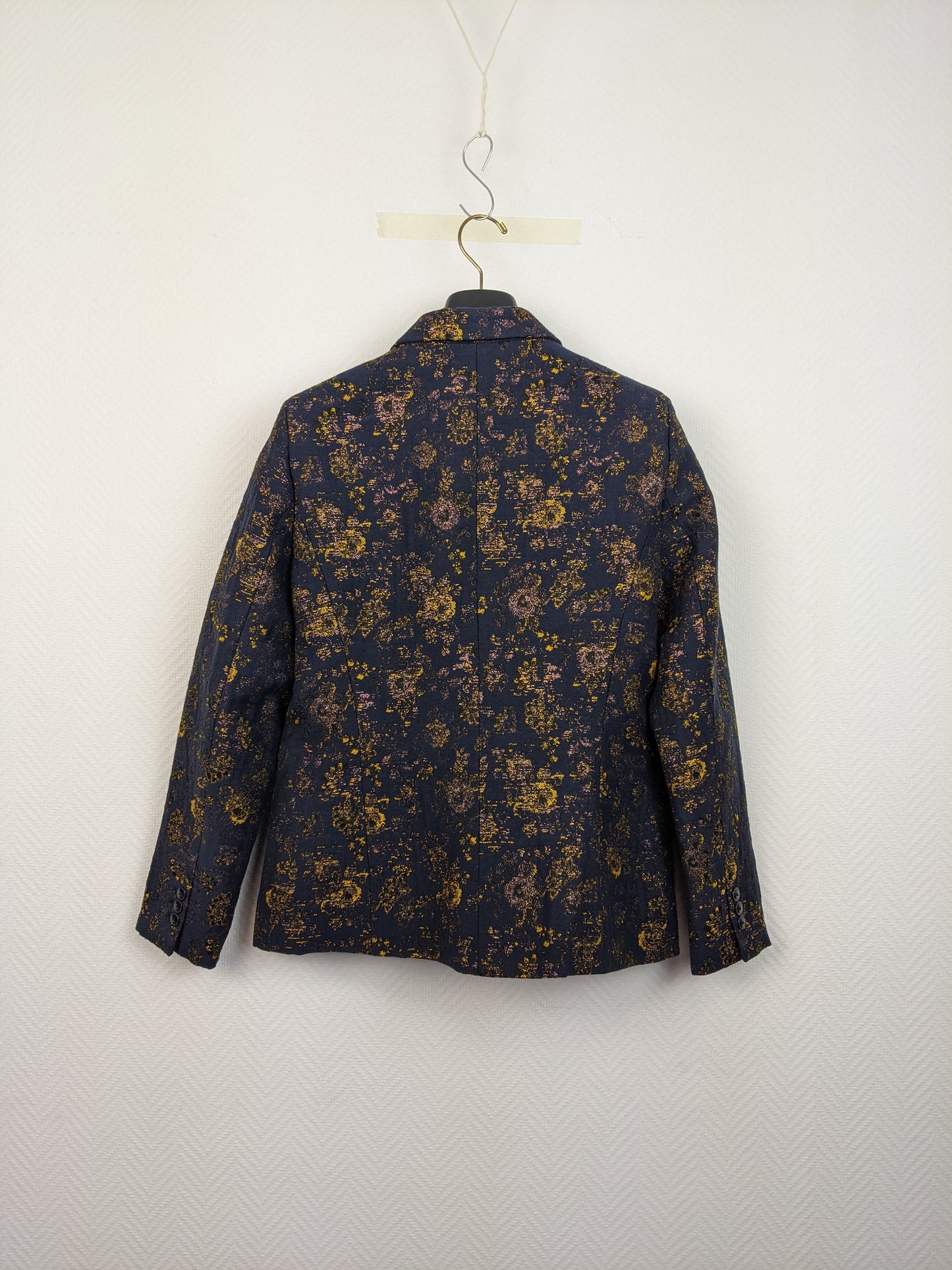 Back view of Caroll floral patterned blazer