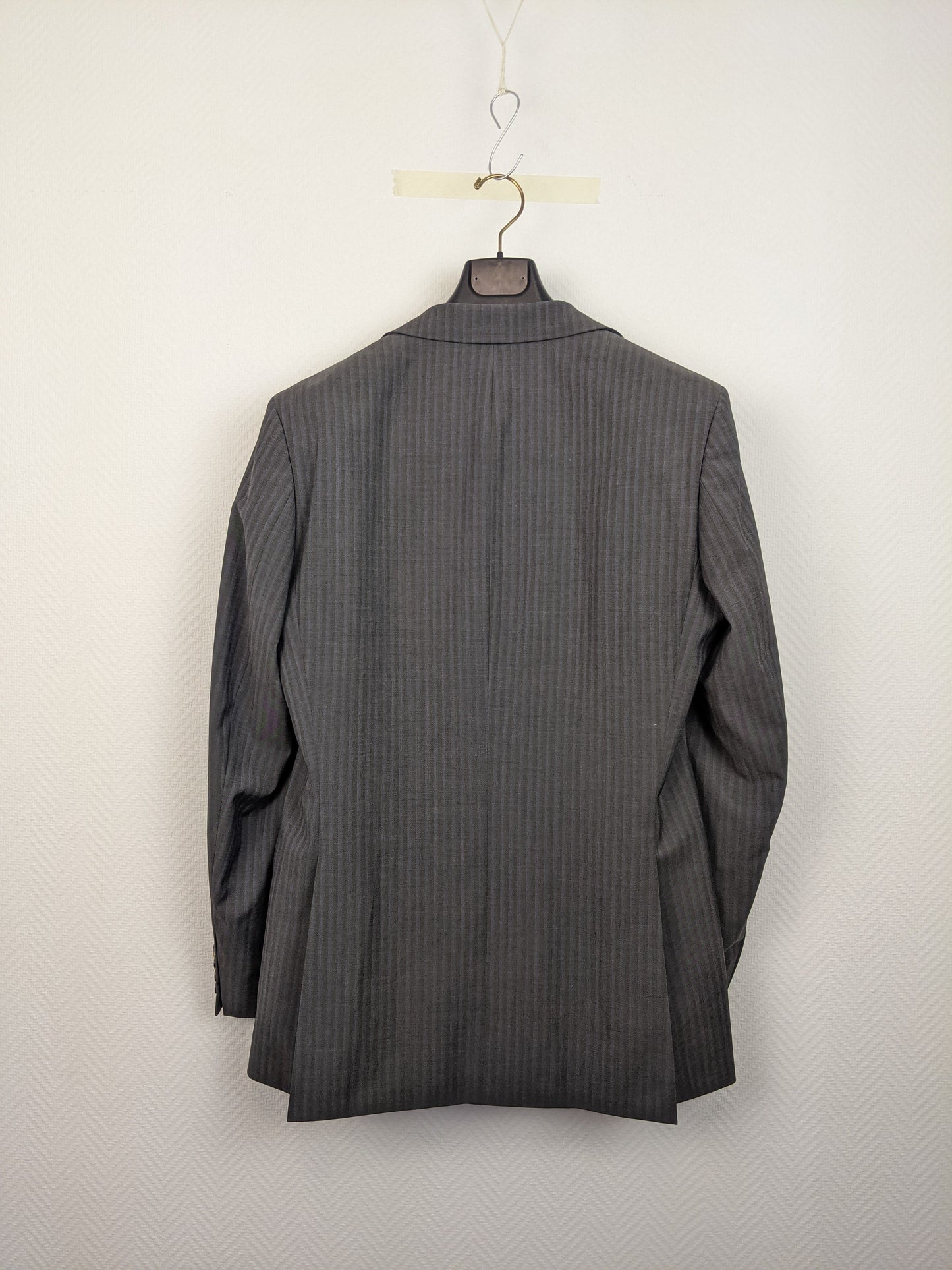 Back view of gray pinstripe suit jacket