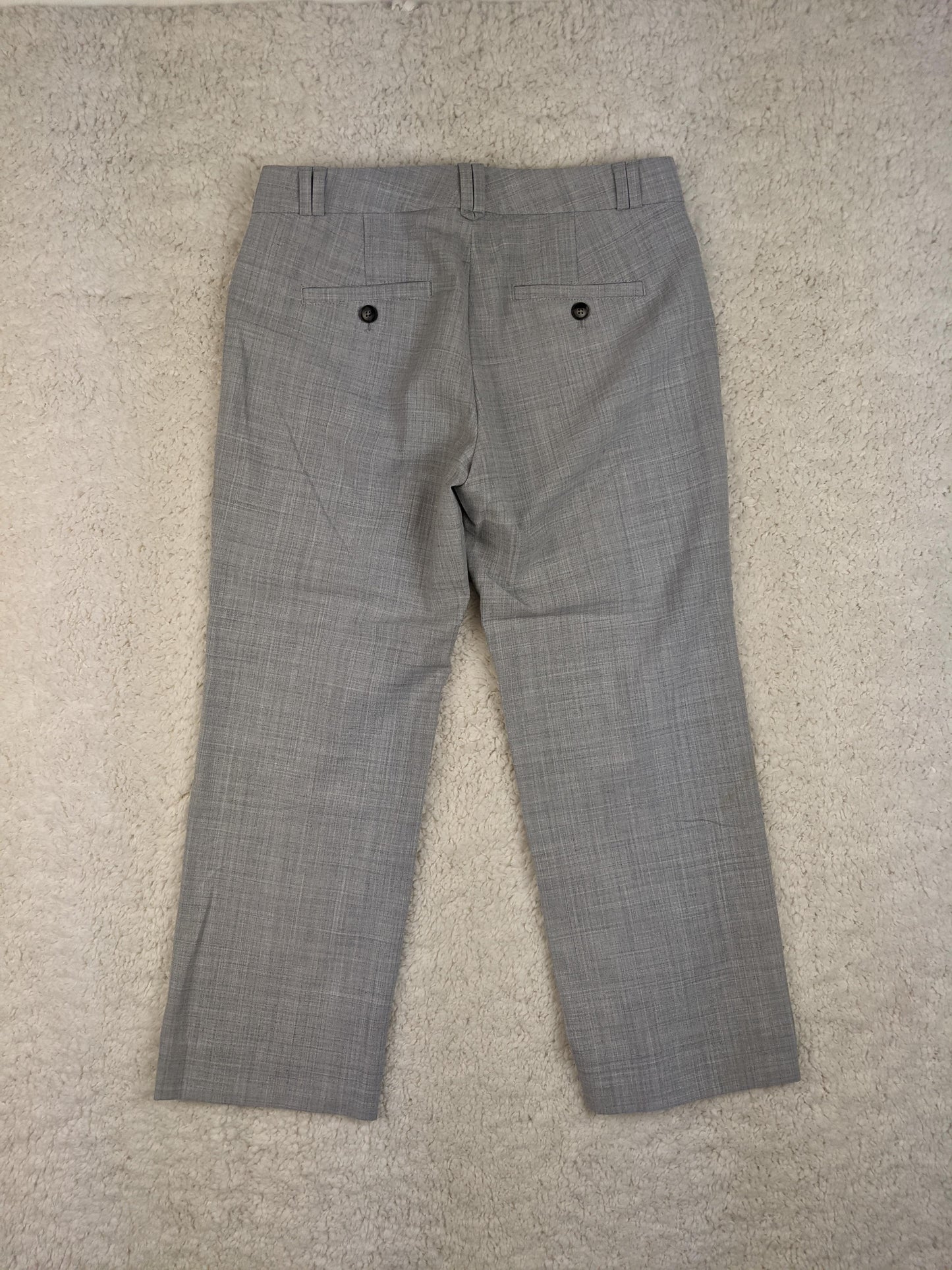 Back view of gray cropped trousers