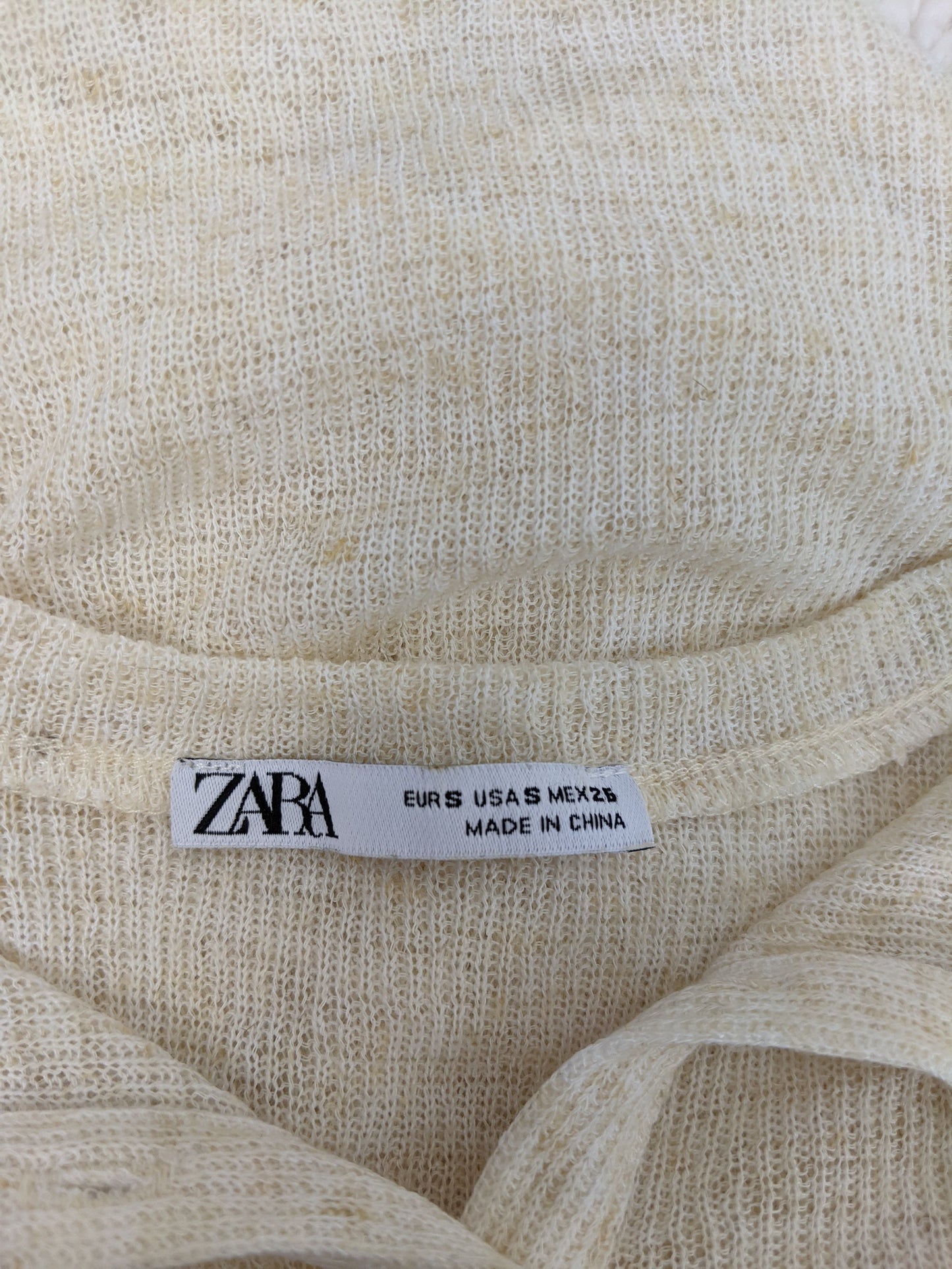 Close-up of Zara label with size information