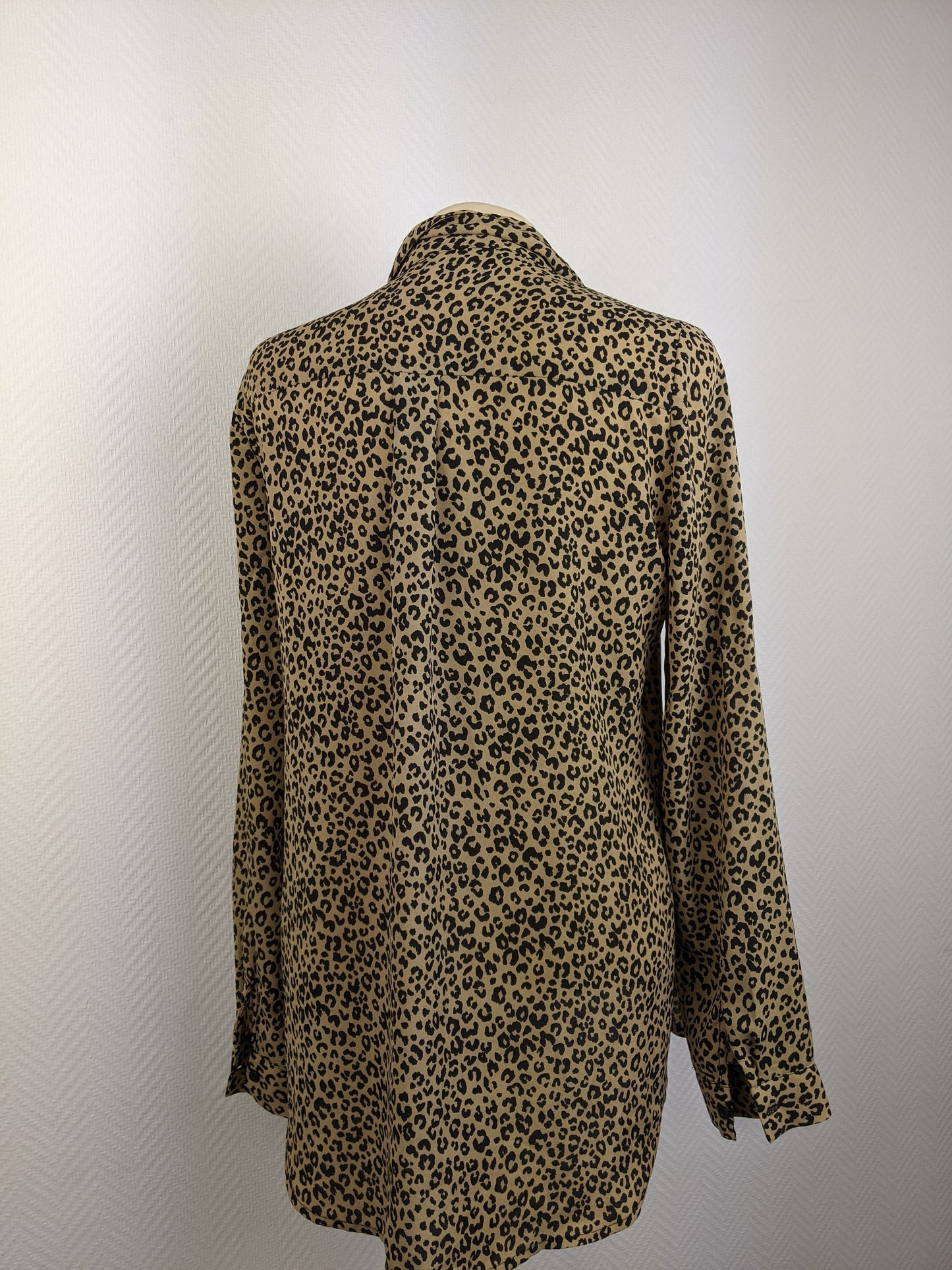 Back view of leopard print blouse