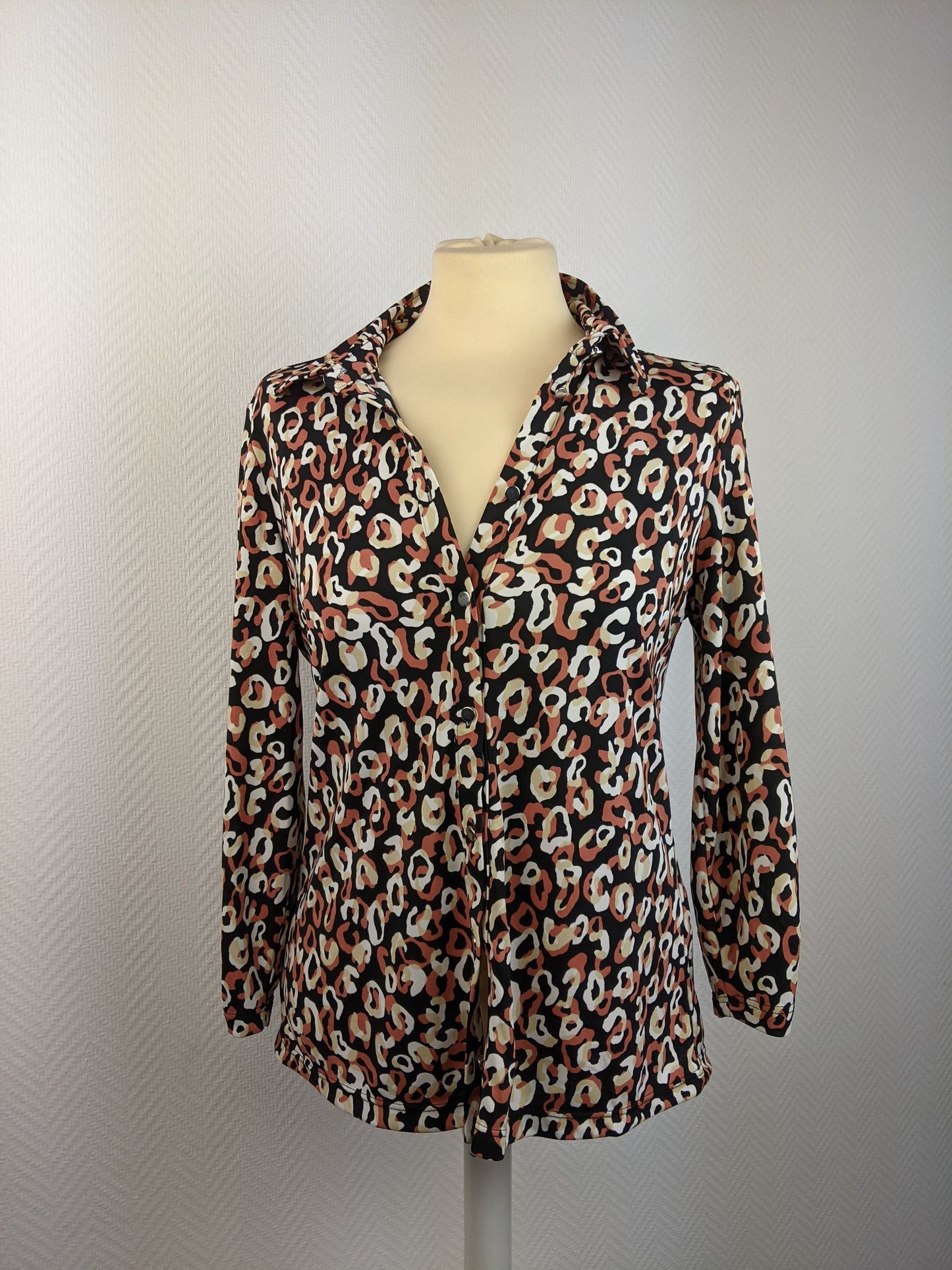 Front view of leopard print blouse