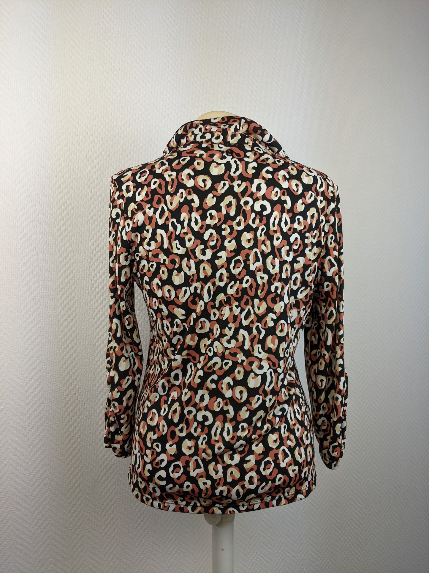 Back view of leopard print blouse
