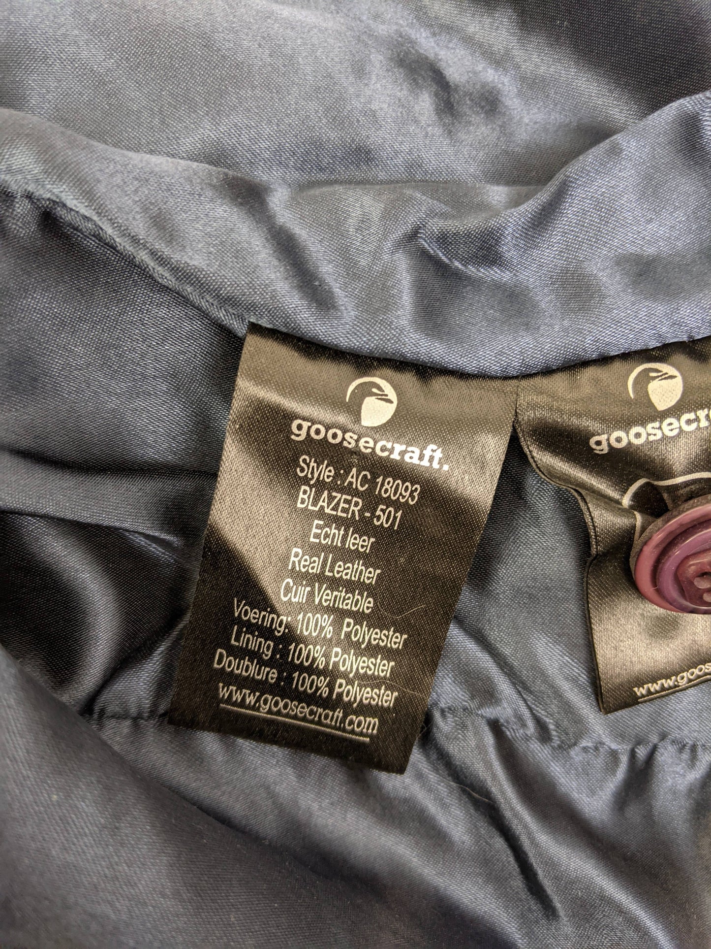 Care and material tag of the Goosecraft blazer