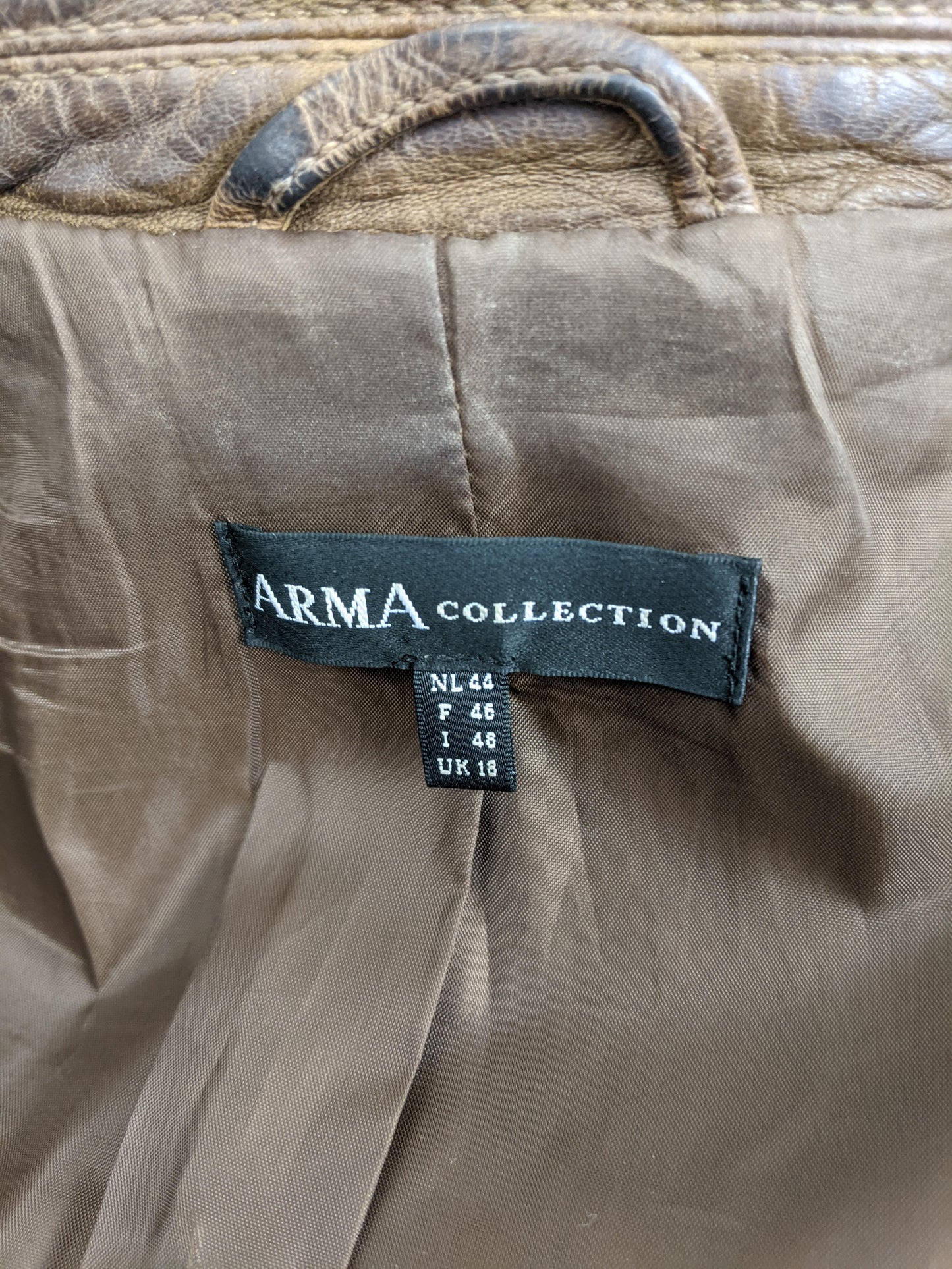 Label showing Arma brand and size