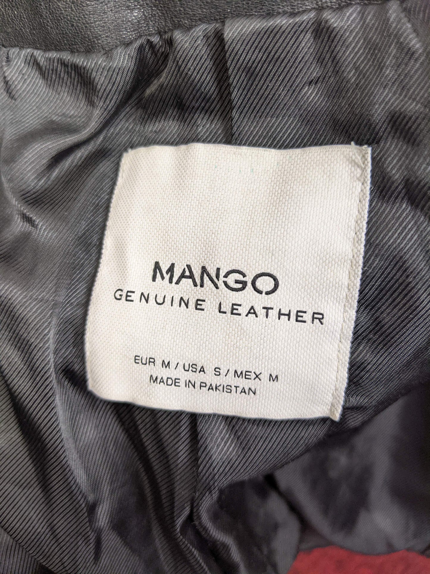Close-up of Mango label inside jacket