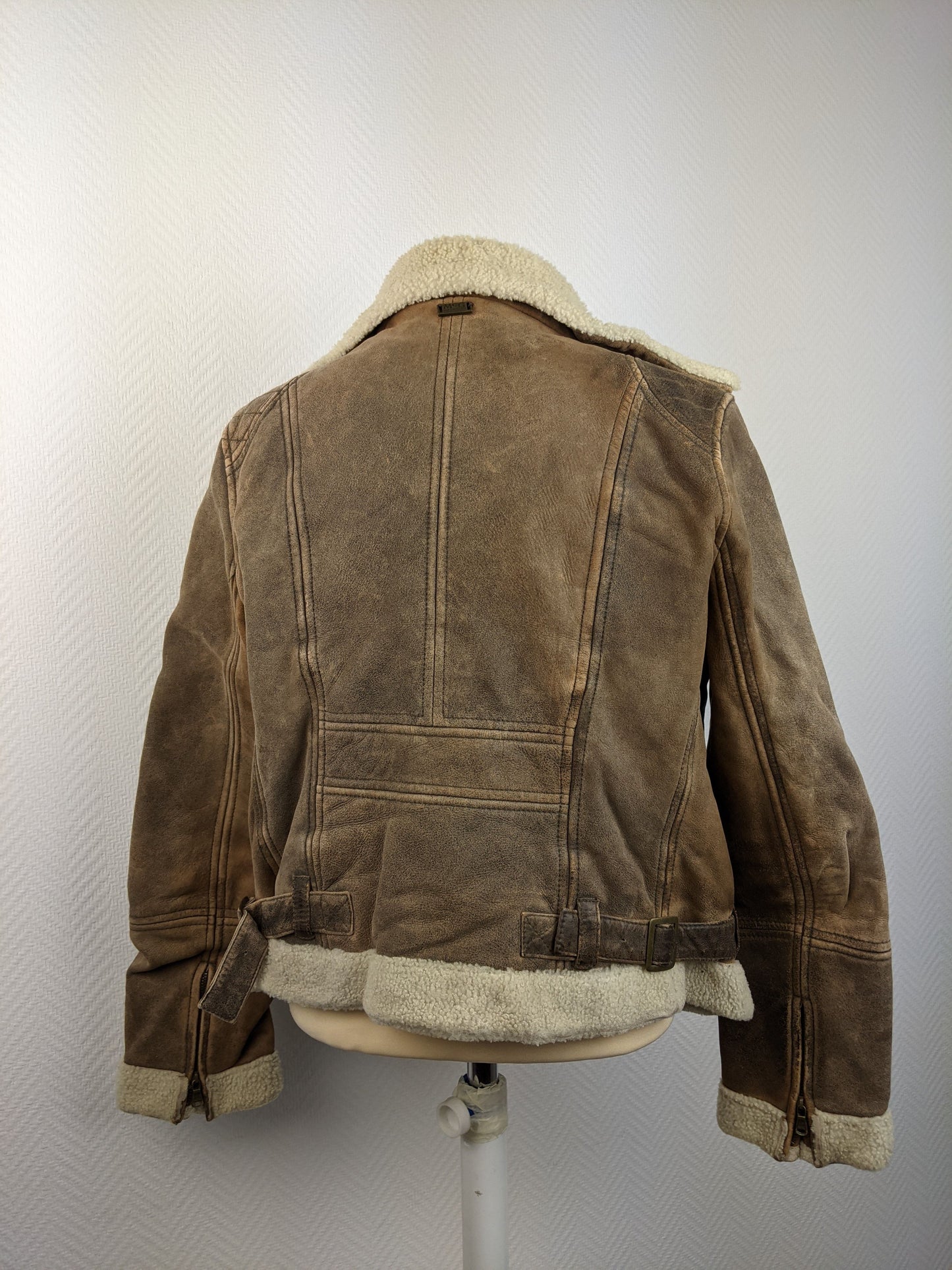 Back view of brown shearling jacket