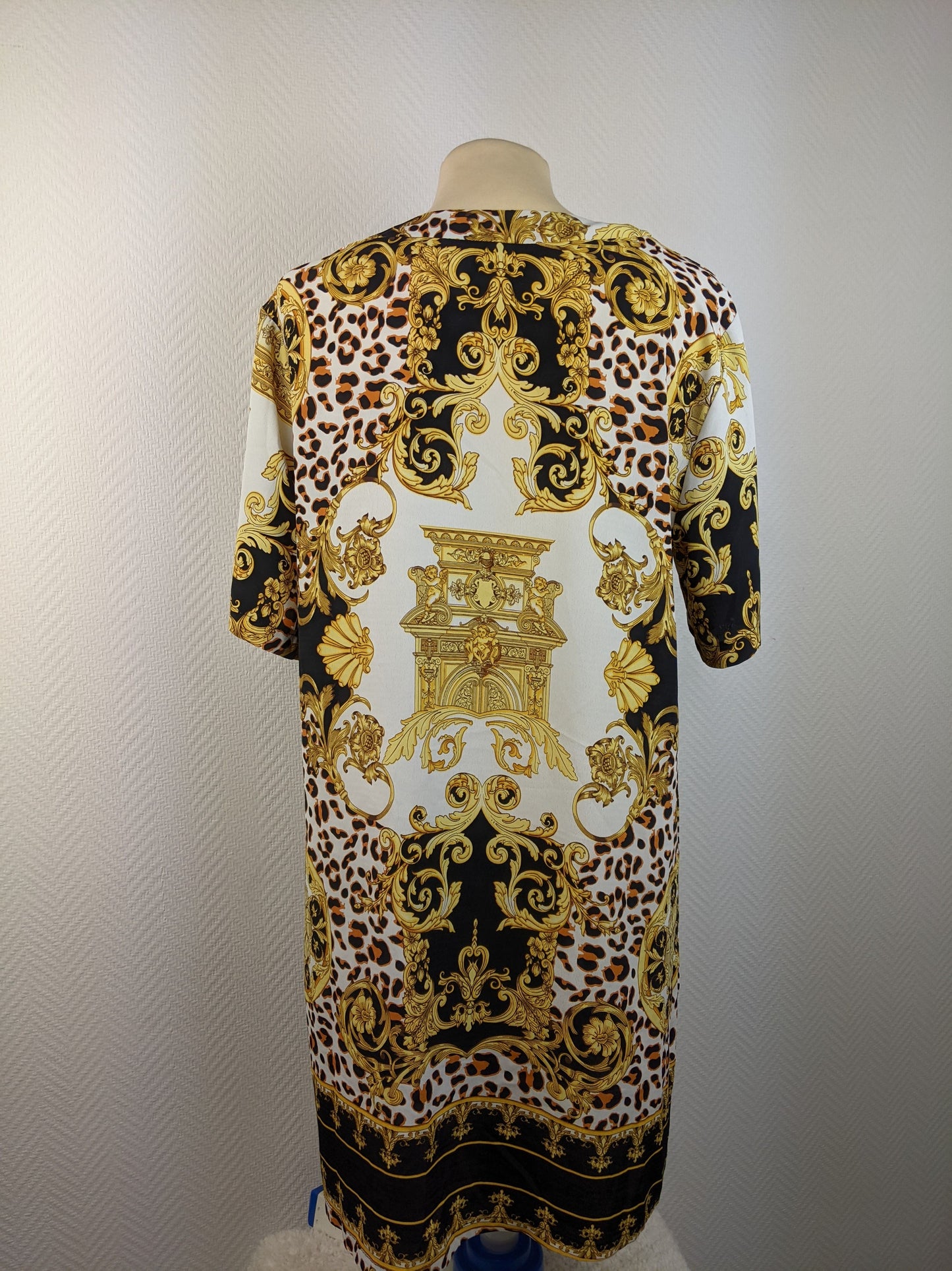 Back view of Rebel Marabel leopard and baroque print dress